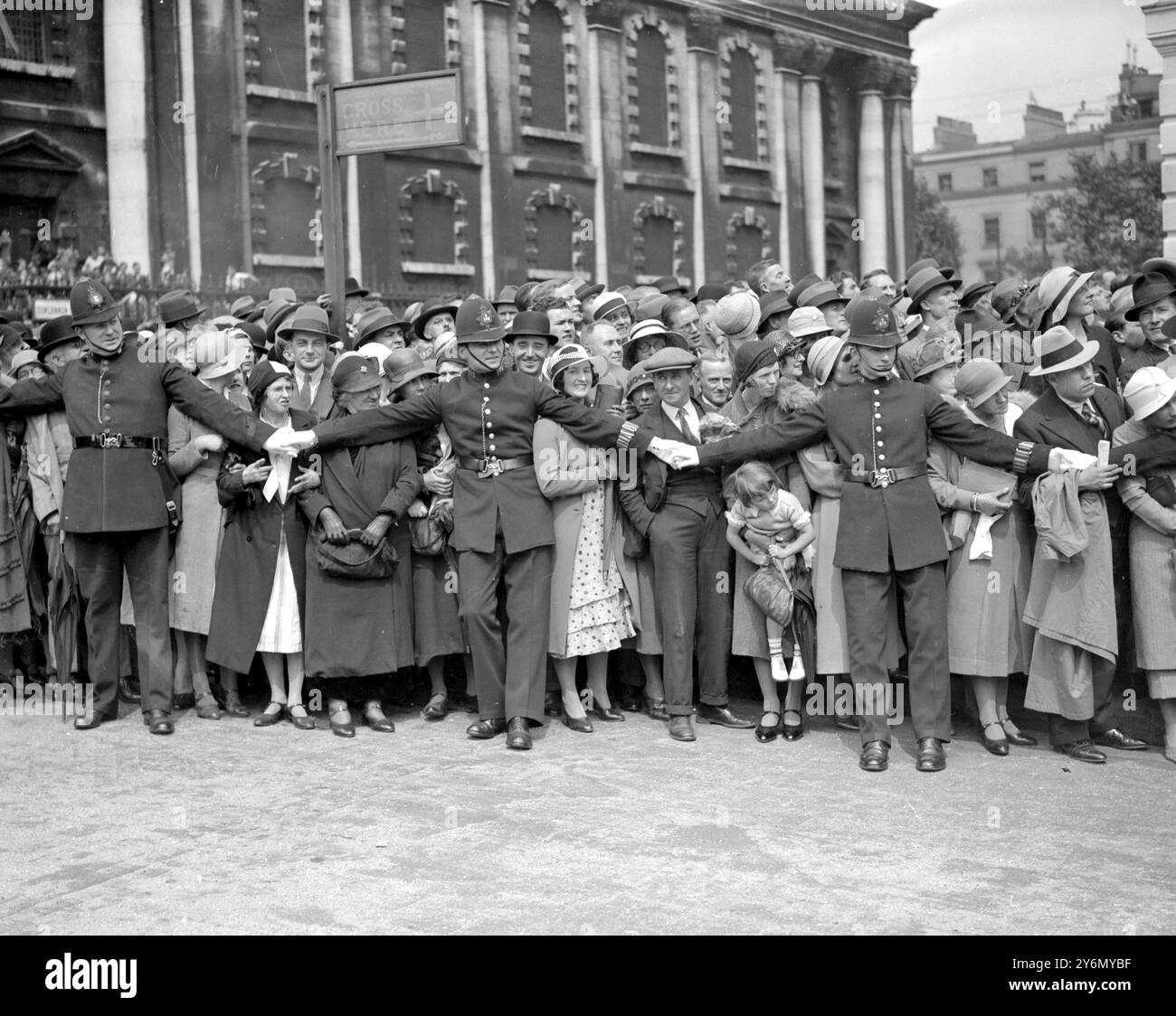 A typical scene of London Police Controlling crowds. At opening of ...