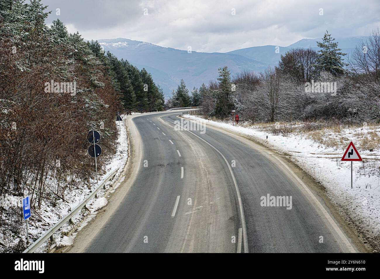 Road in the forest in winter Stock Photo - Alamy