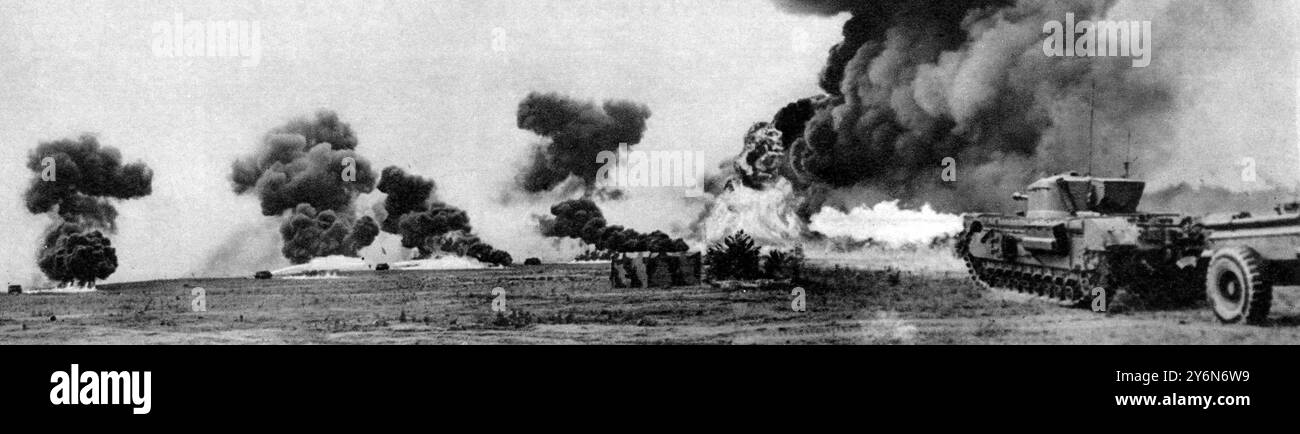 British Crocodile flame-throwers going into action. These devastating weapons have blasted countless enemy strong-points out of action in the great victory in France, and have destoyed much German armour  1944 Stock Photo