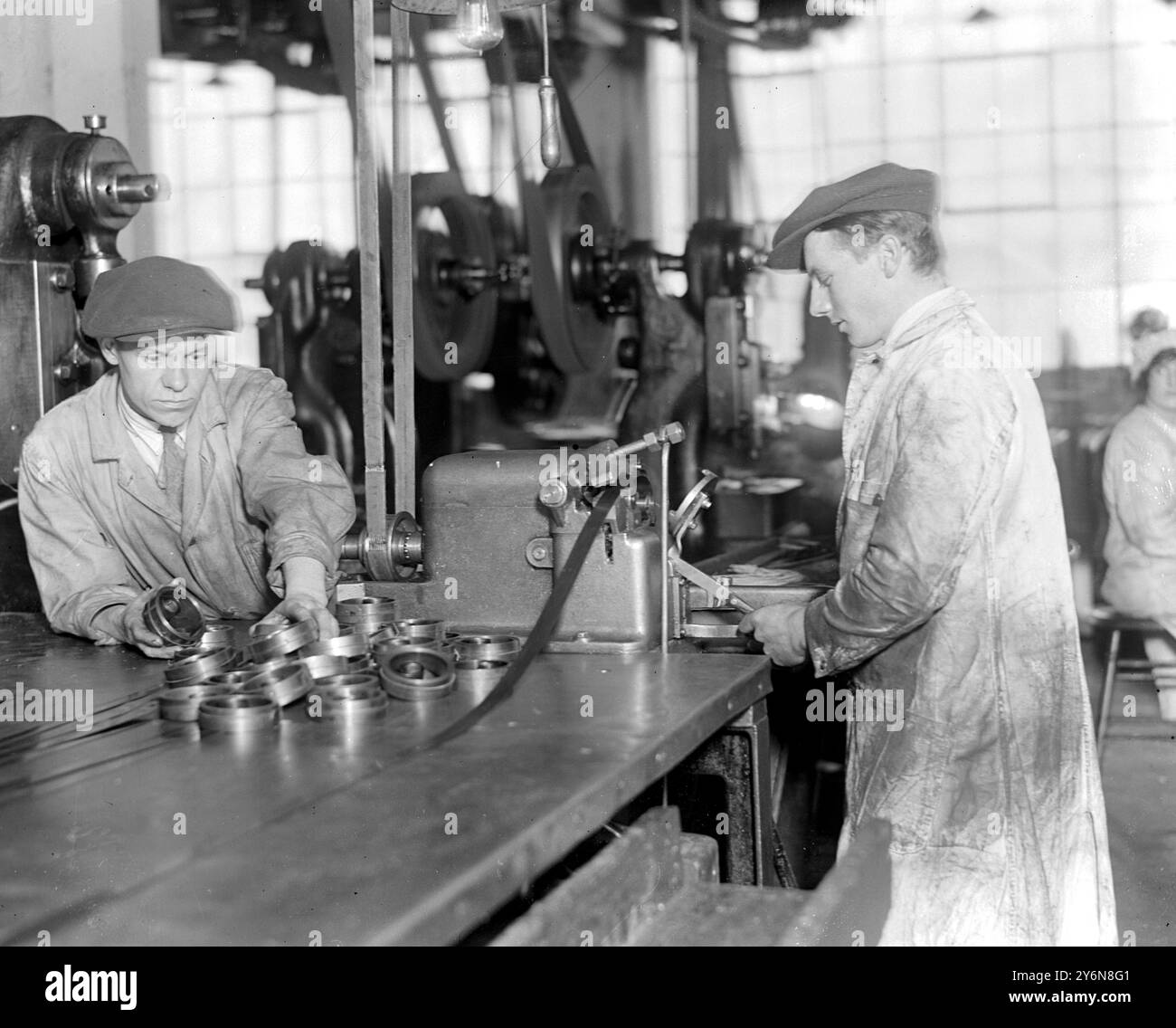 Taken at the Gramophone Works at Hayes. Coiling mainsprings for the Gramophone machine.. Stock Photo