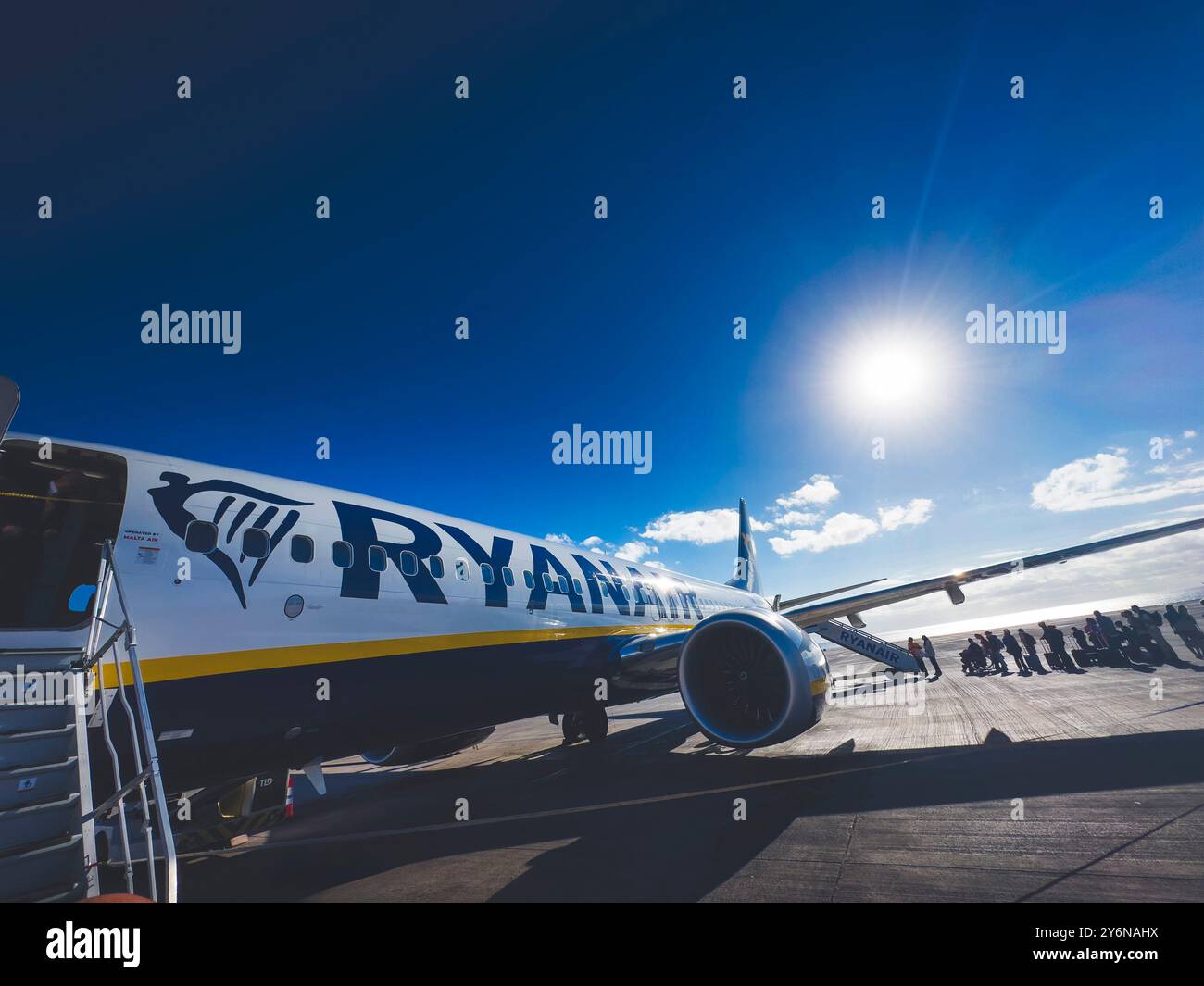 Spain, Canary Islands, Lanzarote, Ryanair plane, at Arrecife airport. Passengers boarding directly on the tarmac. Stock Photo
