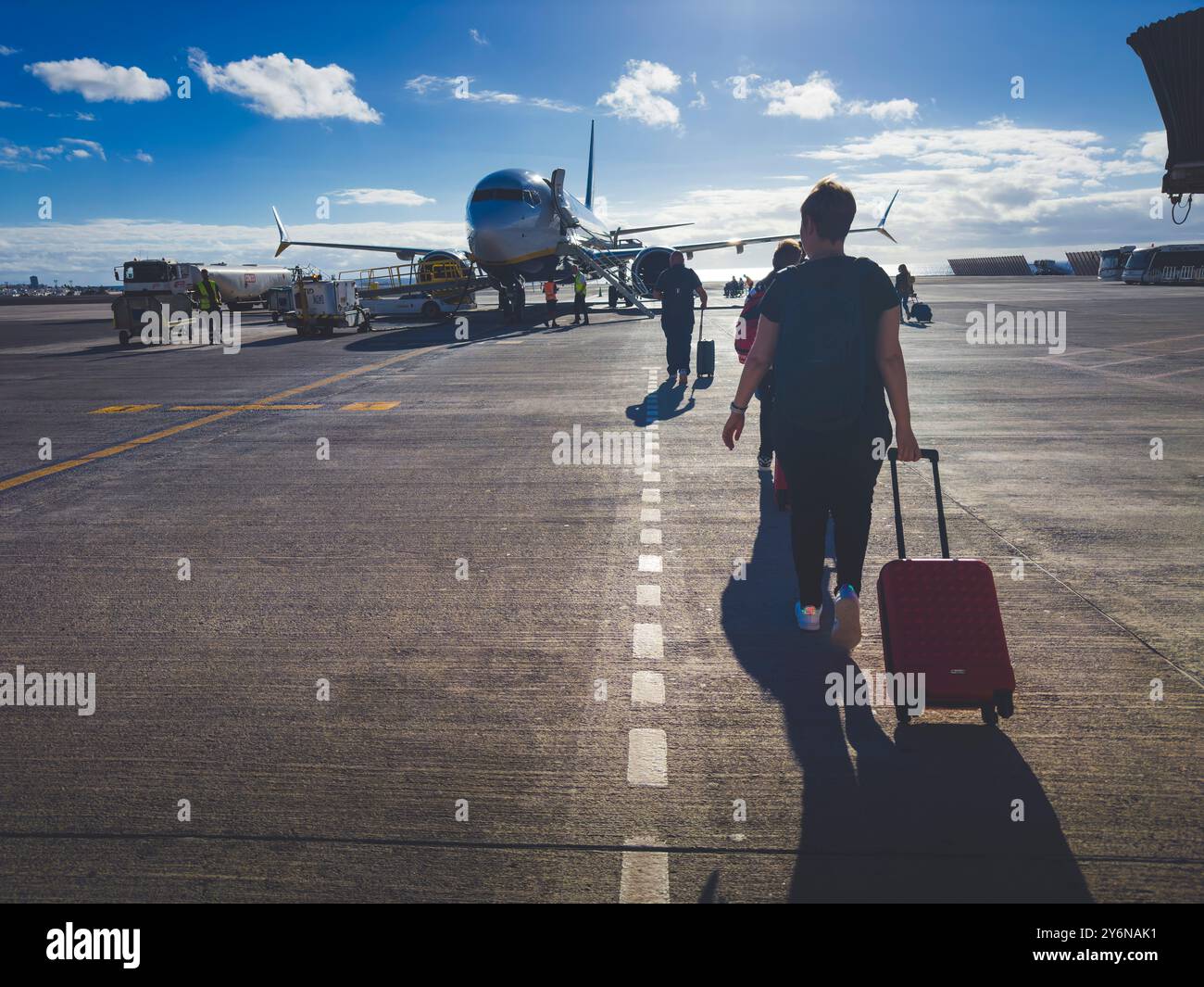 Spain, Canary Islands, Lanzarote, Ryanair plane, at Arrecife airport. Passengers boarding directly on the tarmac. Stock Photo