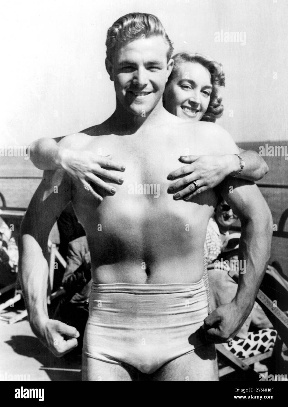a-great-hunk-of-man-gets-an-appreciative-hug-from-hilda-parkin-now