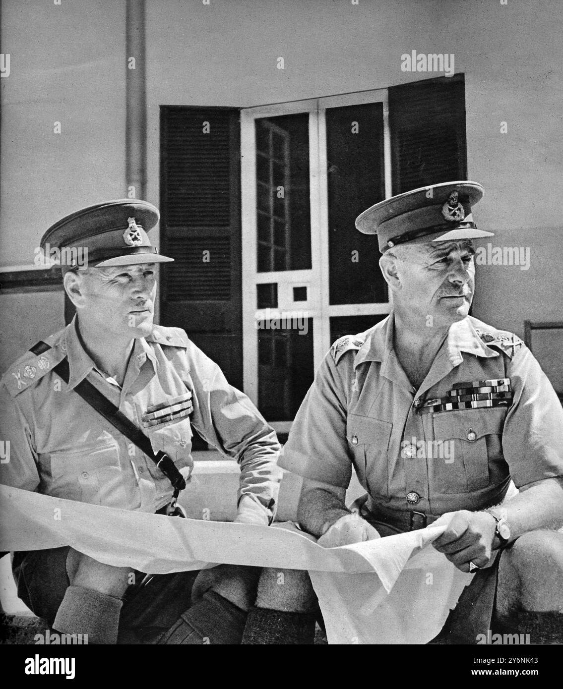 The two men on whom the fate of nations hangs, Generals Sir Archibald Wavell and Claude Auchinleck in consultation. They direct the two critical areas of the war from Libya to the Philippines They are at HQ in Java   January 1942  ©2004 Credit:Topfoto      Wavell, Archibald Percival, Viscount British general; viceroy of India 1943-1947  1883-1950     Auchinleck, Claude John Eyre, Sir British marshal in World War II  1884-1981 Stock Photo