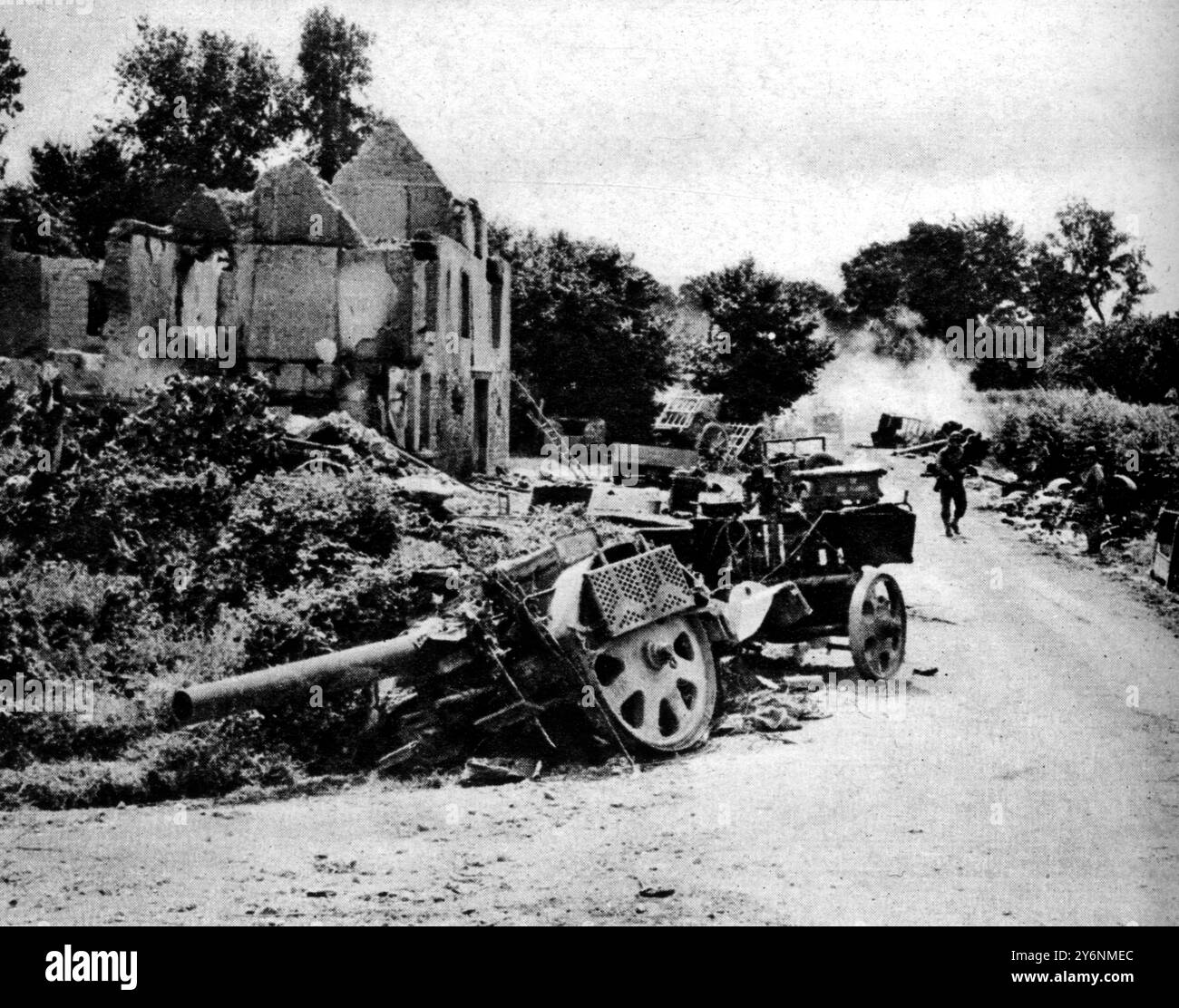 German tanks and vehicles wrecked by American armour in a country setting in Normandy remeniscent of the Devon landscape in which the US troops rehearsed for such battles to come. August 1944  ©2004 Topfoto Stock Photo