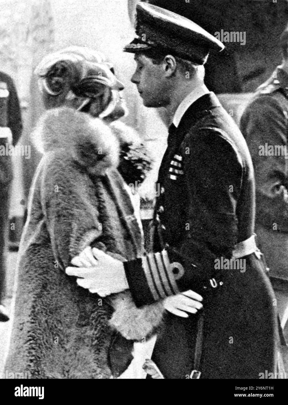 Good-Bye to the Duke and Duchess of York. The Prince of Wales gives his sister-in-law a farewell kiss: a happy snapshot of the Prince and Duchess of York on Board the 'Renown' at Portsmouth.  15 January 1927 Stock Photo