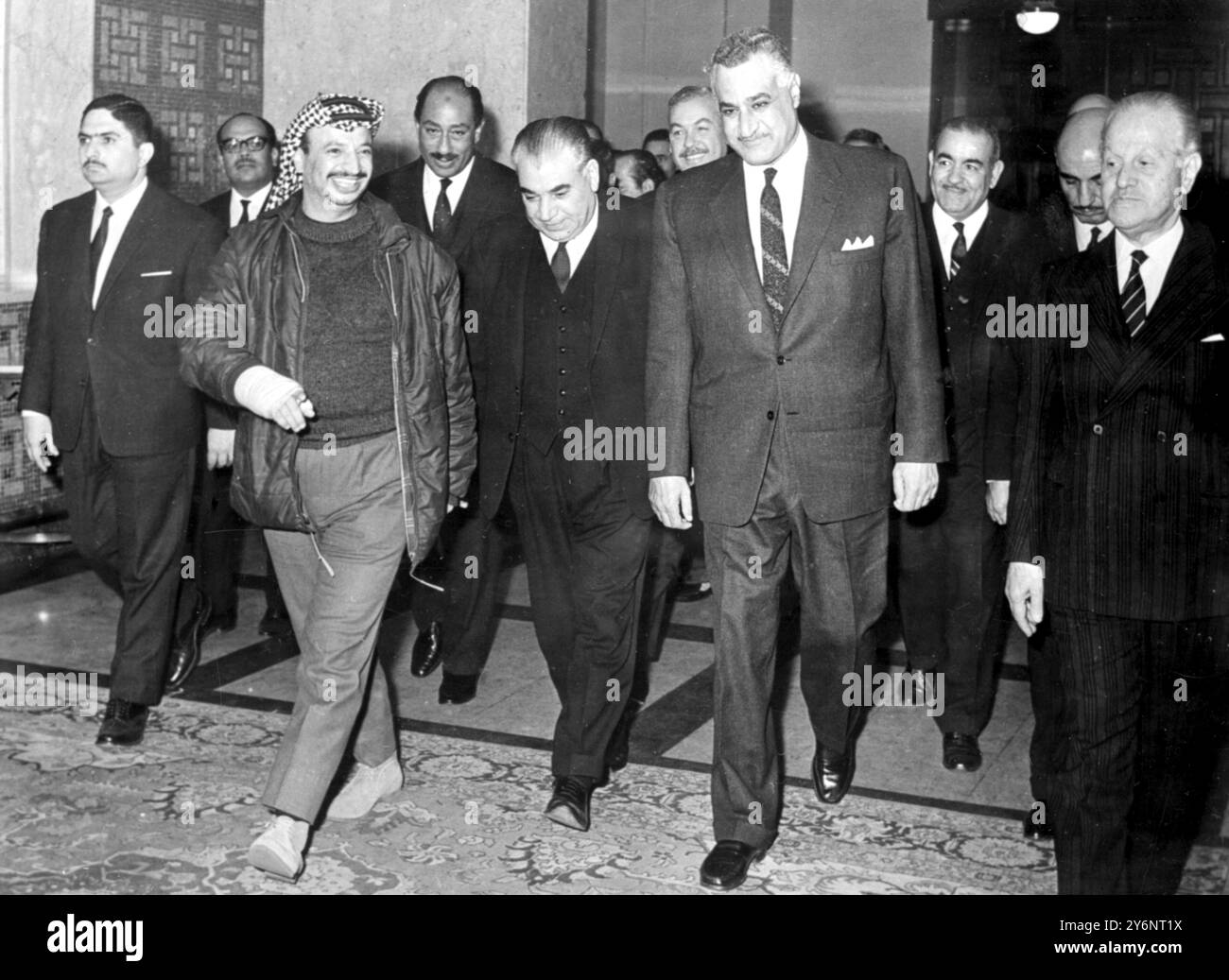 Cairo, Egytp: Leaving the Koubbah Republic Palace here last month after a meeting in which the New PLO (Palestine Liberation Organisation) leader was welected are Left to Right PLO Chariman, Yassir Arafat (The Elected PLO leader); former PLO Chariman, Yehia Hammouda; and UAR President, Gamul Abdul Nasser. . 11 March 1969 Stock Photo