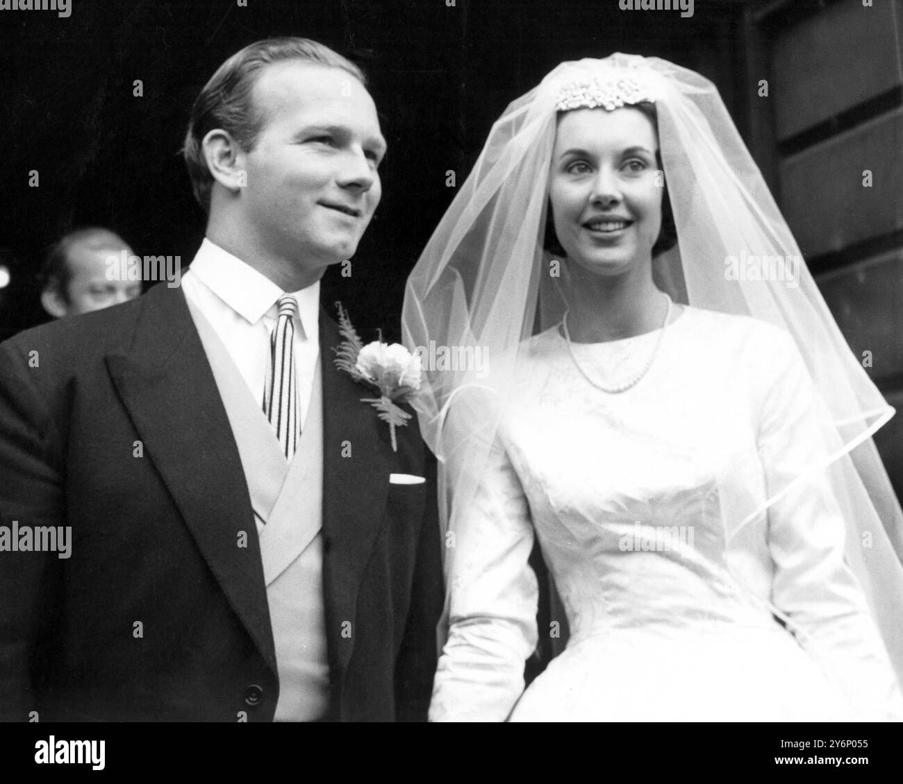 A May, 1960 Library picture of Mr Robert Sangster, the day he wed the former Miss Christine Street, at Penrith, Cumbria. Mr Sangster, Verona Pools 40-year old joint chairman was today reported to have run off with the wife of Australia's Foreign Affairs Minister. A South of France hotel confirmed they had both been staying there but had left this morning.  Mr Sangster, is said to have seperated from his wife and run off with Mrs Susan Peacock, 34. Her father is Mr John Rossiter, Agent-General in London for Victoria State, Australia.  11 June 1976 Stock Photo