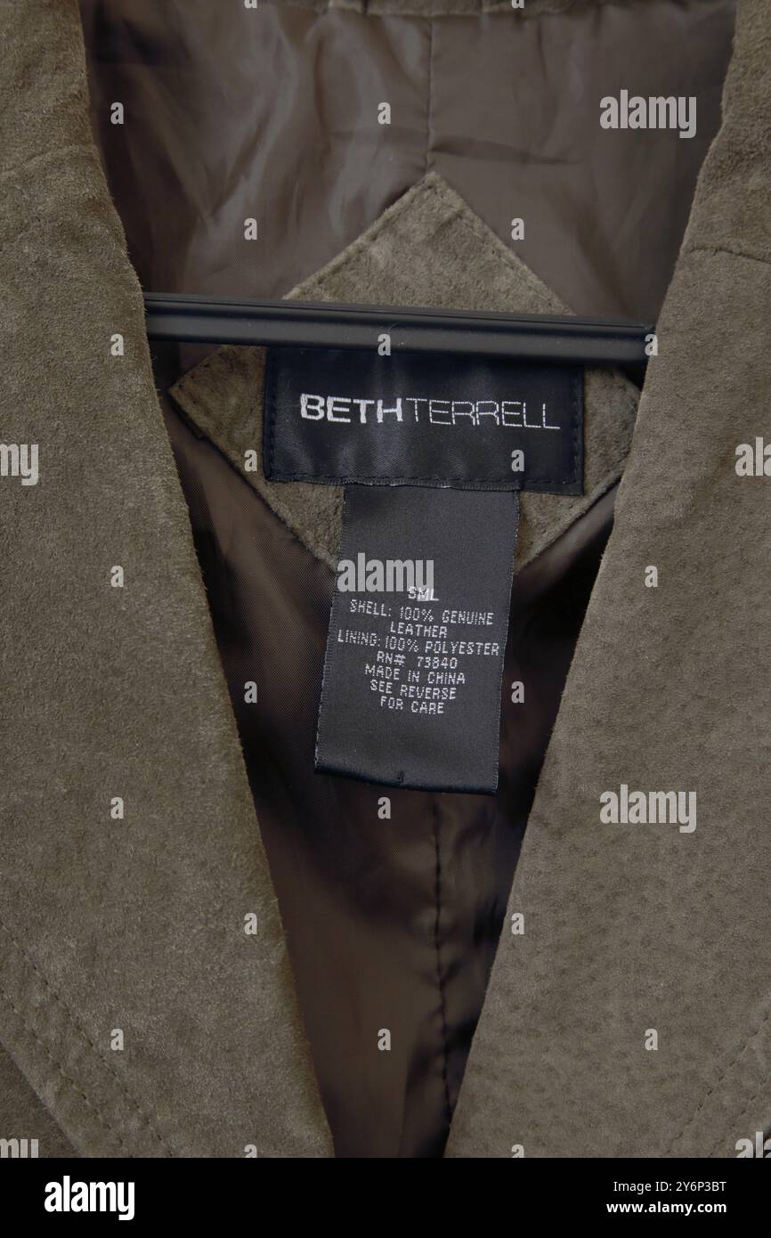 Designer Beth Terrell Olive Green Suede Jacket Labels Stock Photo