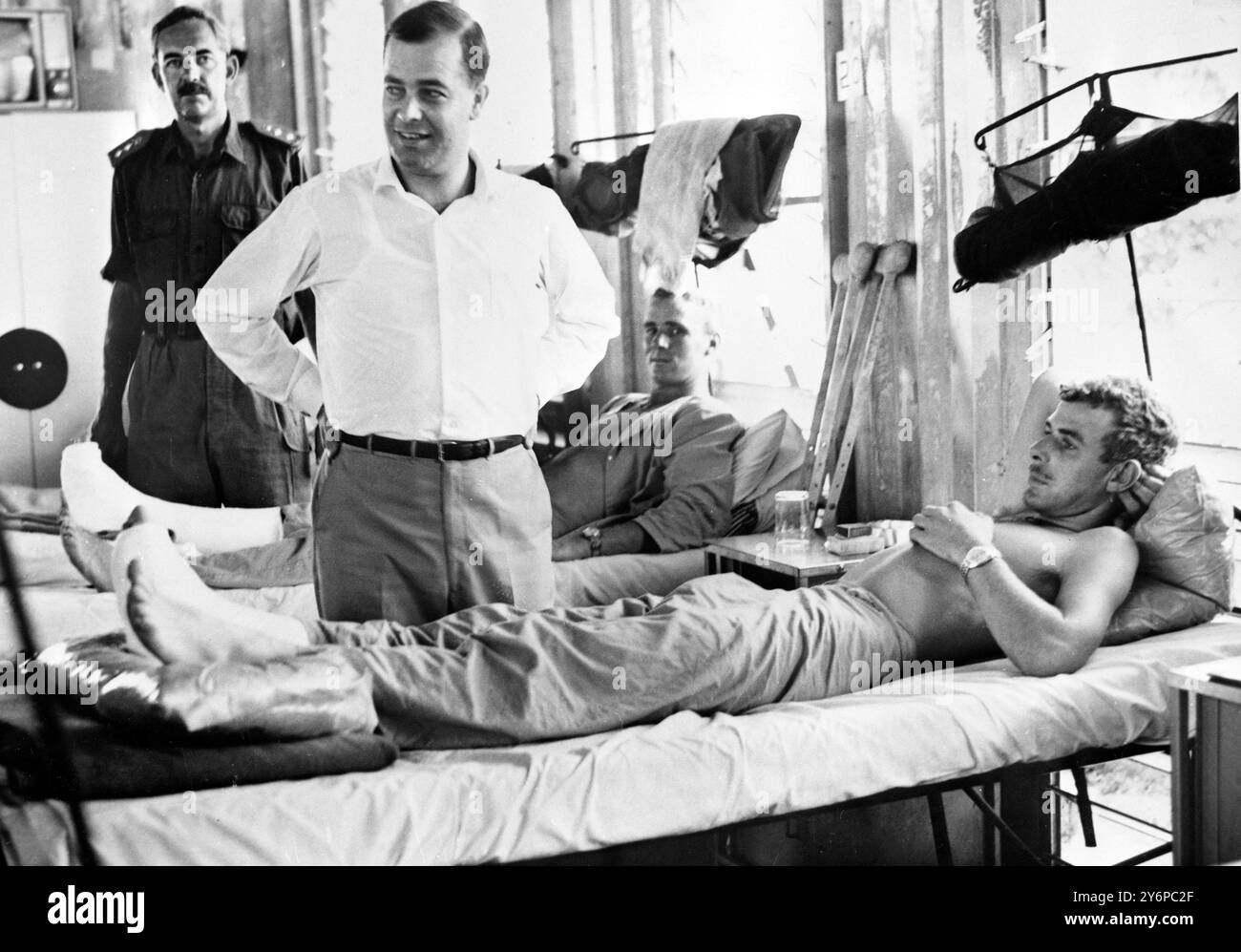 Phillip Lynch , Australian Minister for the Army , chats with members ...