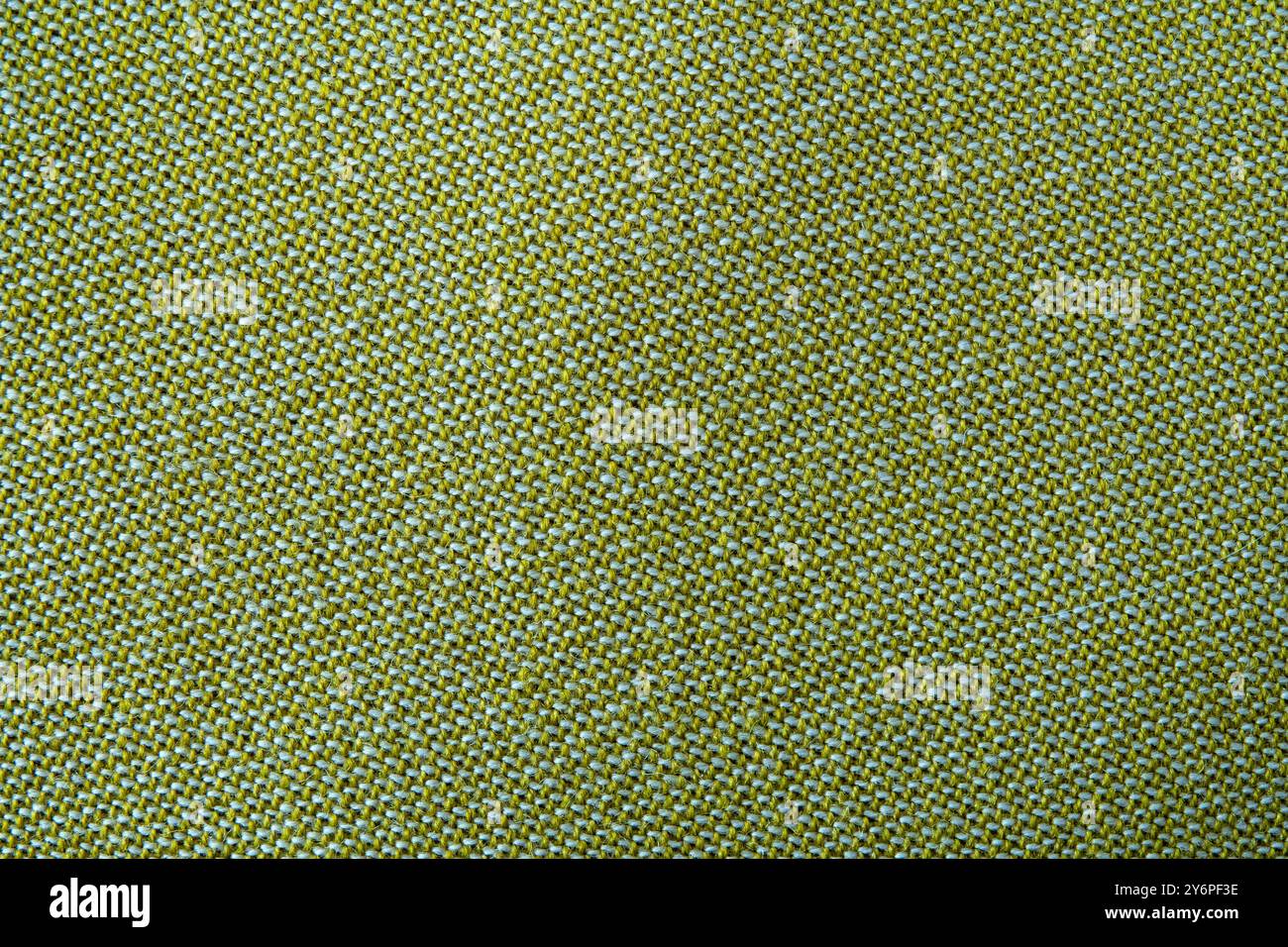 Green textile pattern fabric for background. Top view. Stock Photo