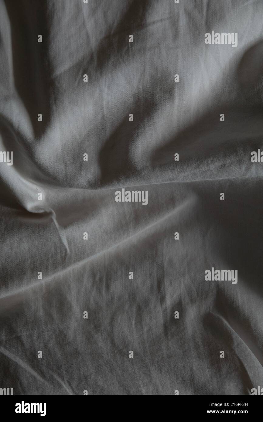 Gray textile folded fabric for background. Top view. Stock Photo