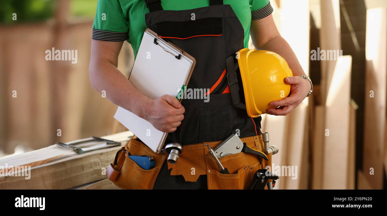 Handyman with tool belt and construction instruments male worker Stock ...