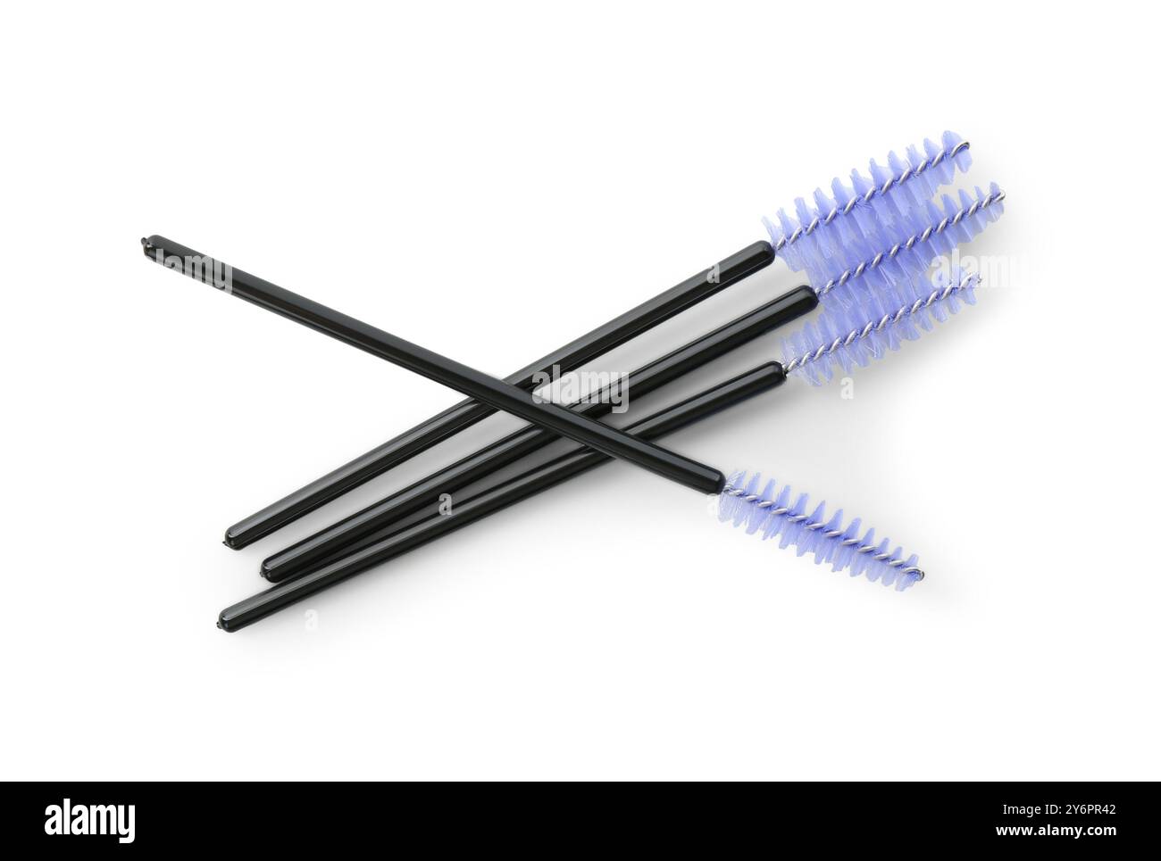 Disposable makeup brushes isolated on white, top view Stock Photo