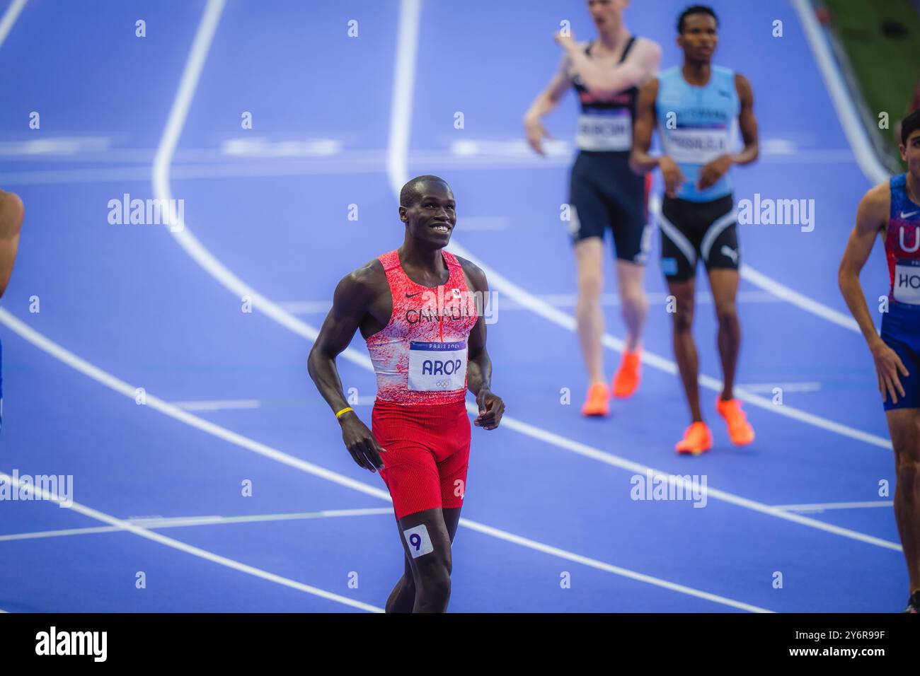 Marco Arop participating in the 800 meters at the Paris 2024 Olympic ...