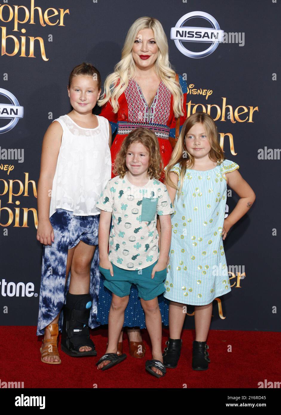 Tori Spelling, Stella Doreen McDermott, Finn Davey McDermott and Hattie Margaret McDermott at the Los Angeles premiere of 'Christopher Robin' held at the Walt Disney Studios in Burbank, USA on July 30, 2018. Stock Photo