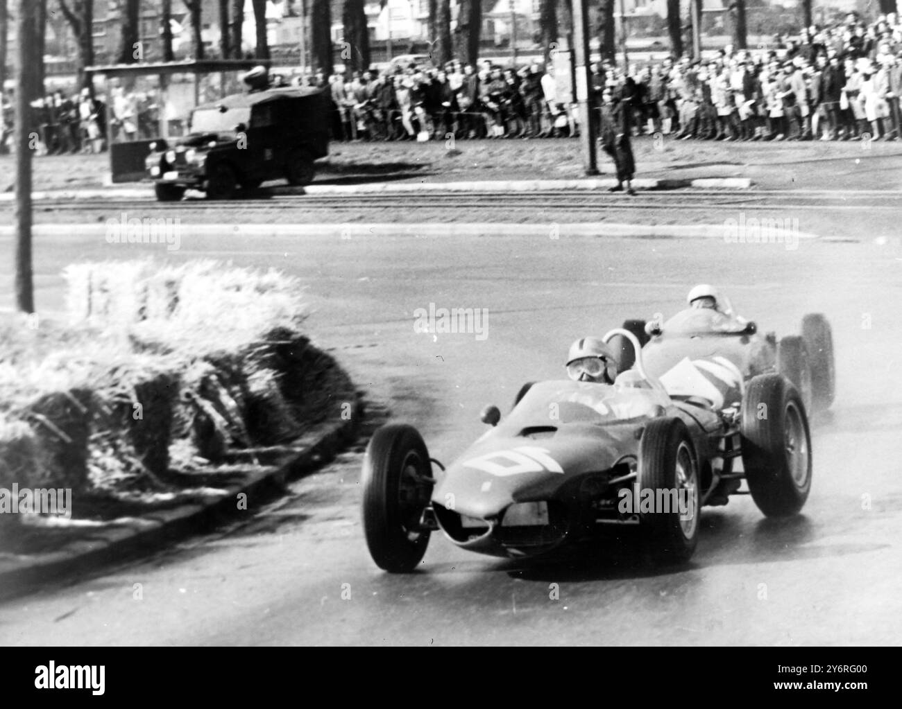 RACING DRIVERS WILLY MAIRESSE AND STIRLING MOSS IN GRAND PRIX ACTION IN ...