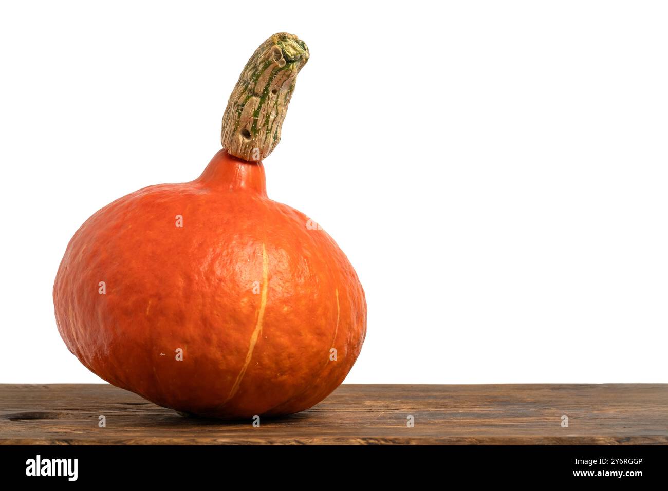 Pumpkin on wooden table isolated on white background Stock Photo