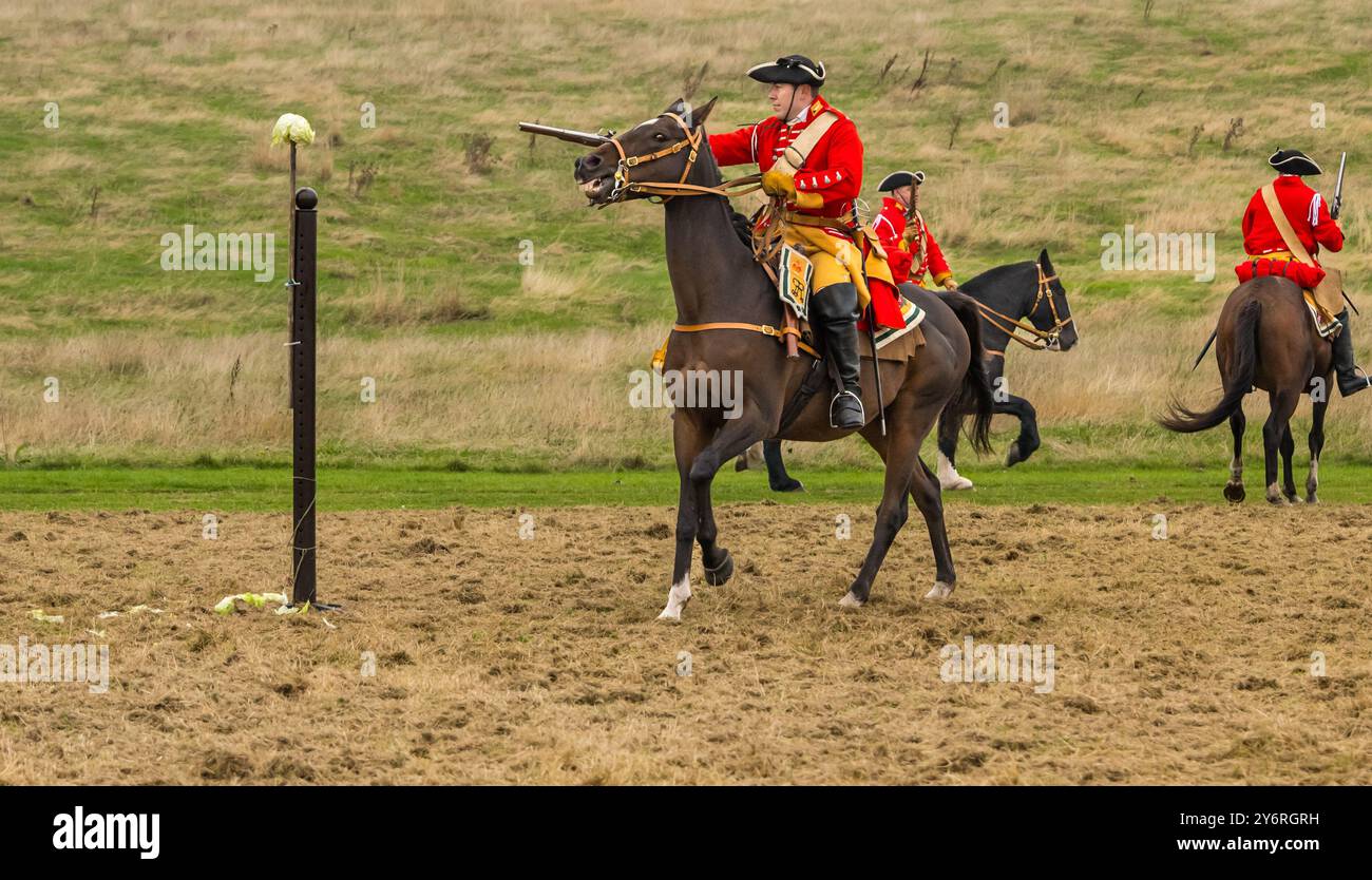 Hanoverian cavalry or redcoat soldier showing skill in Battle of Prestonpans re-enactment, East Lothian, Scotland, UK Stock Photo
