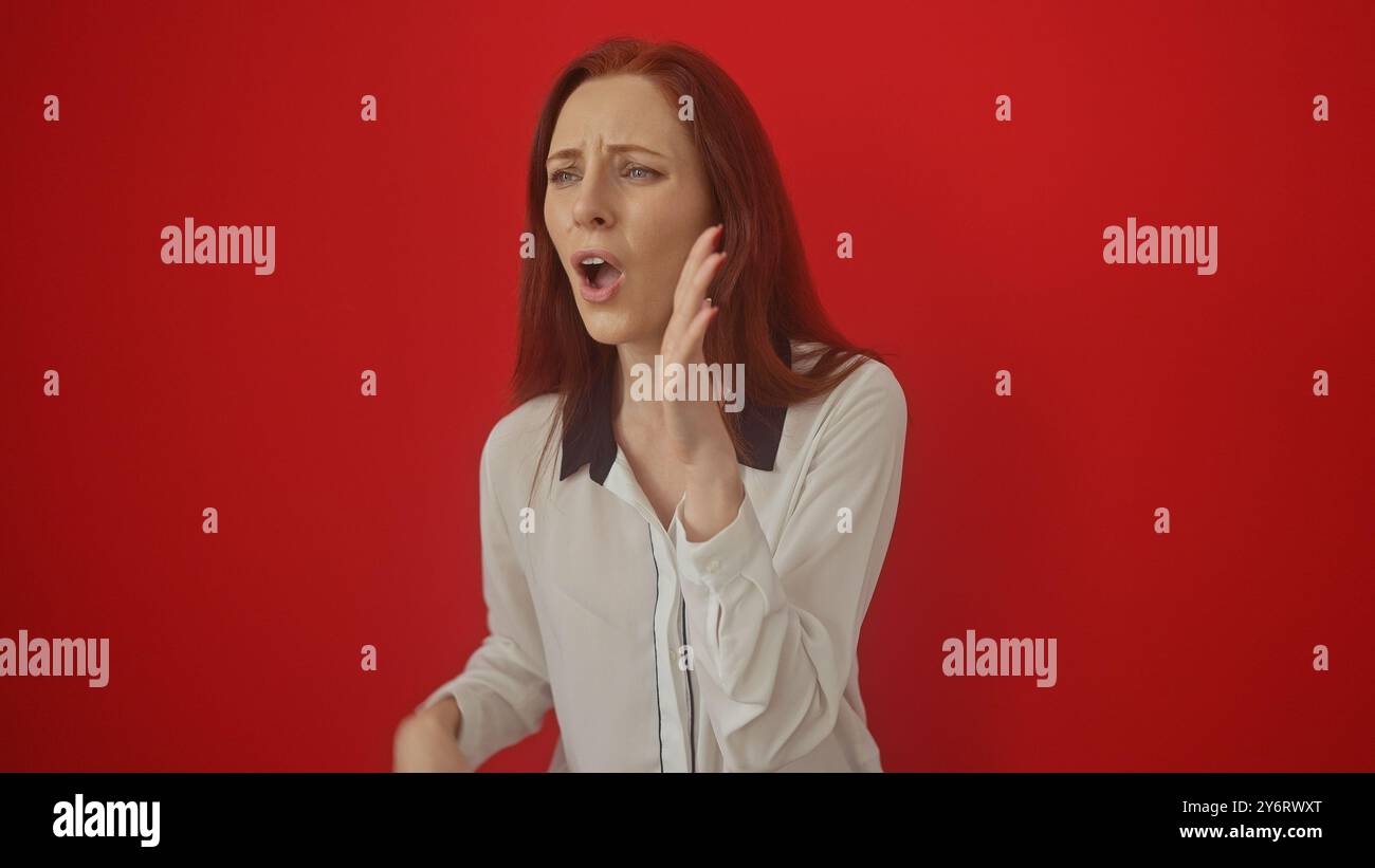 Shocked Expression Red Rays Shocked redhead woman with an expressive face wearing a blouse against ...