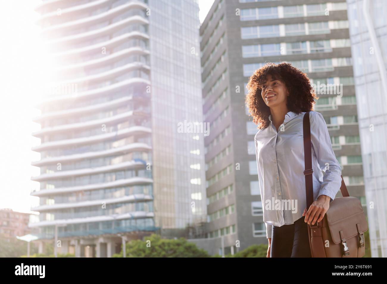 serious female entrepreneur standing at city Stock Photo