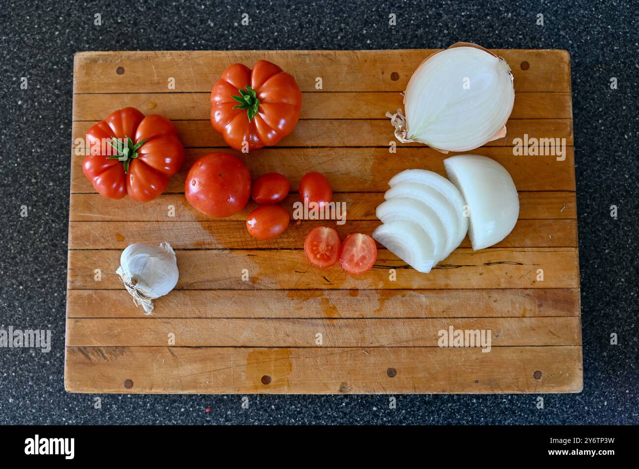 Harvested fresh organic garden tomatoes ready for making homemade healthy sauce and salsas Stock Photo