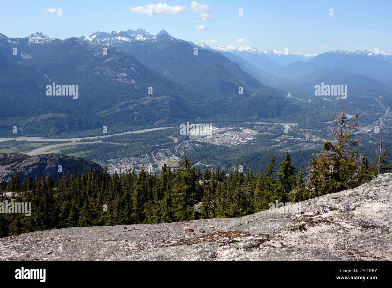 A view of the town of Squamish and its namesake river and valley from the Britannia Mountains above the community, British Columbia, Canada. Stock Photo
