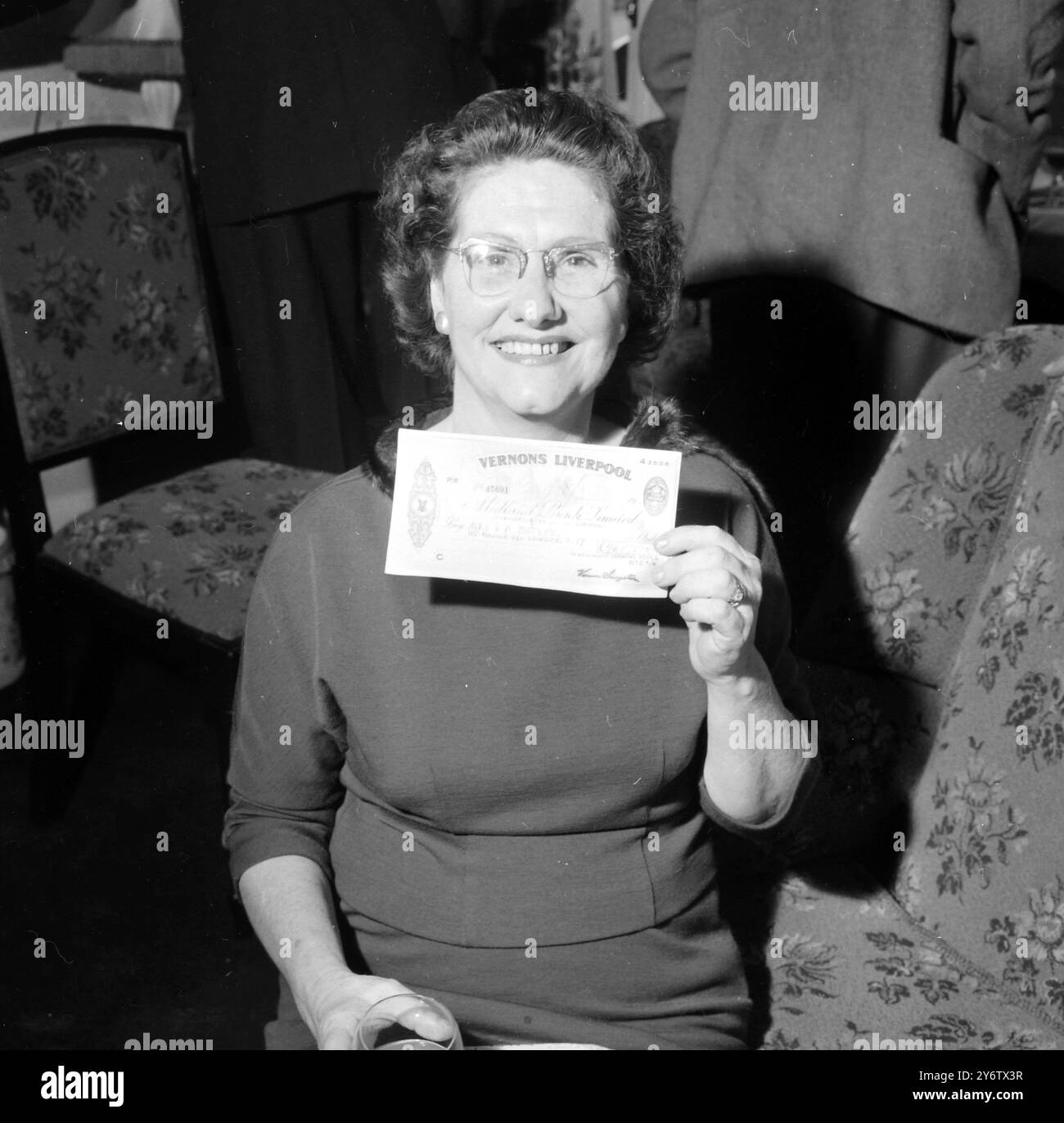Violet Butler Football pools Black and White Stock Photos & Images - Alamy