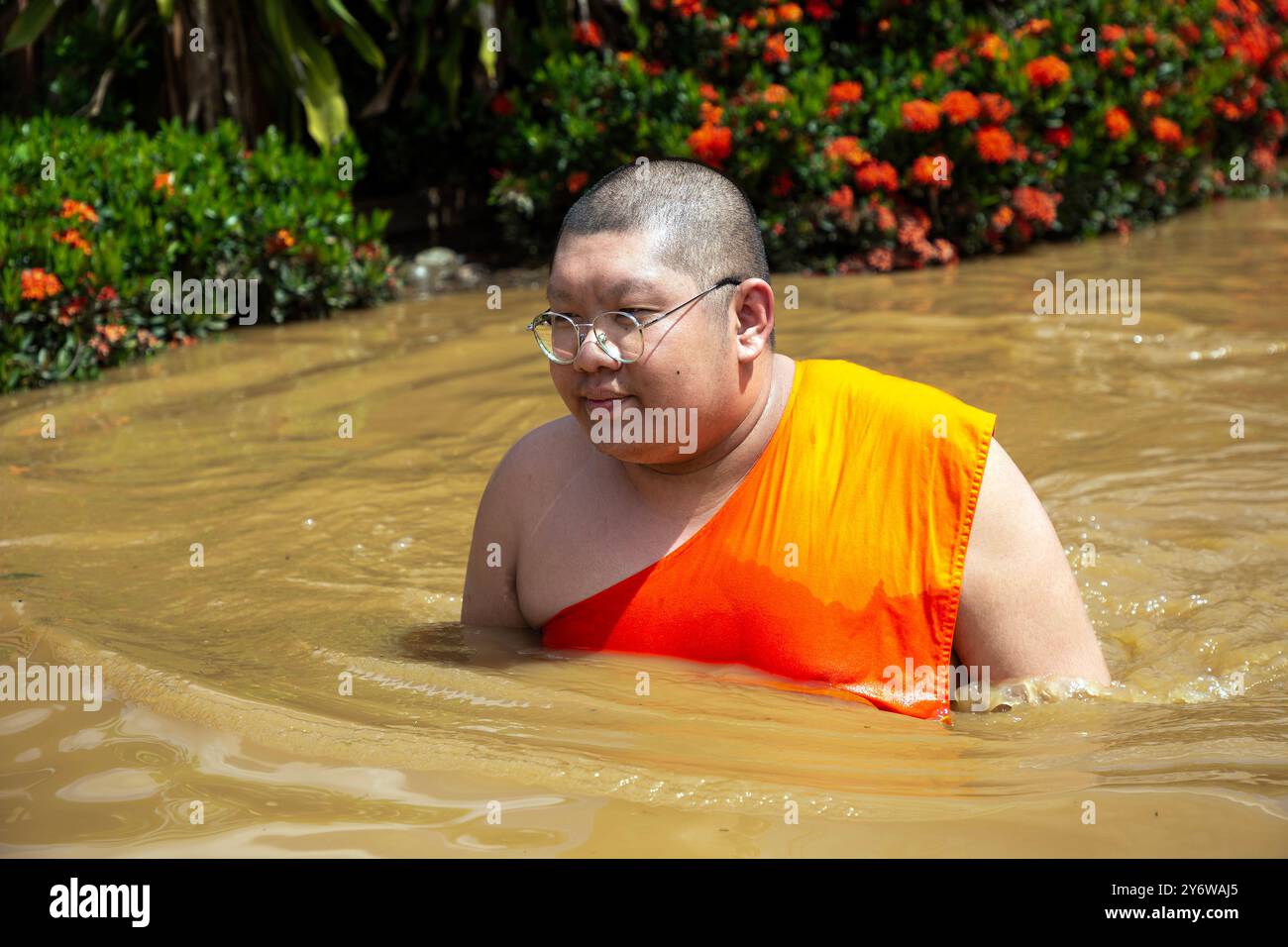 Chiang Mai, Thailand. 26th Sep, 2024. A monk seen walking through