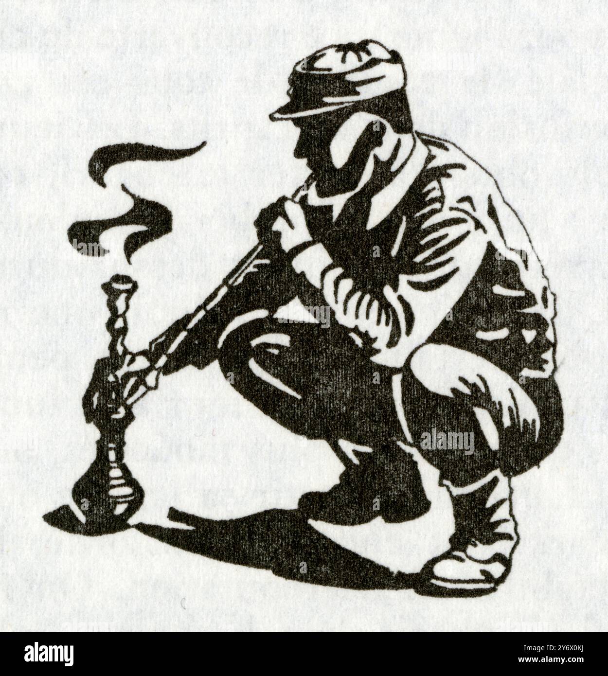 Afghanistan.Un fumeur de chelam, pipe à eau Stock Photo