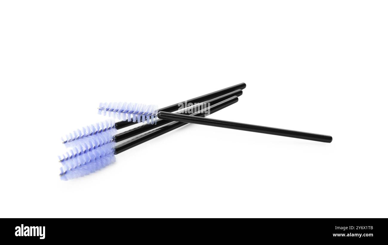 Many disposable makeup brushes isolated on white Stock Photo