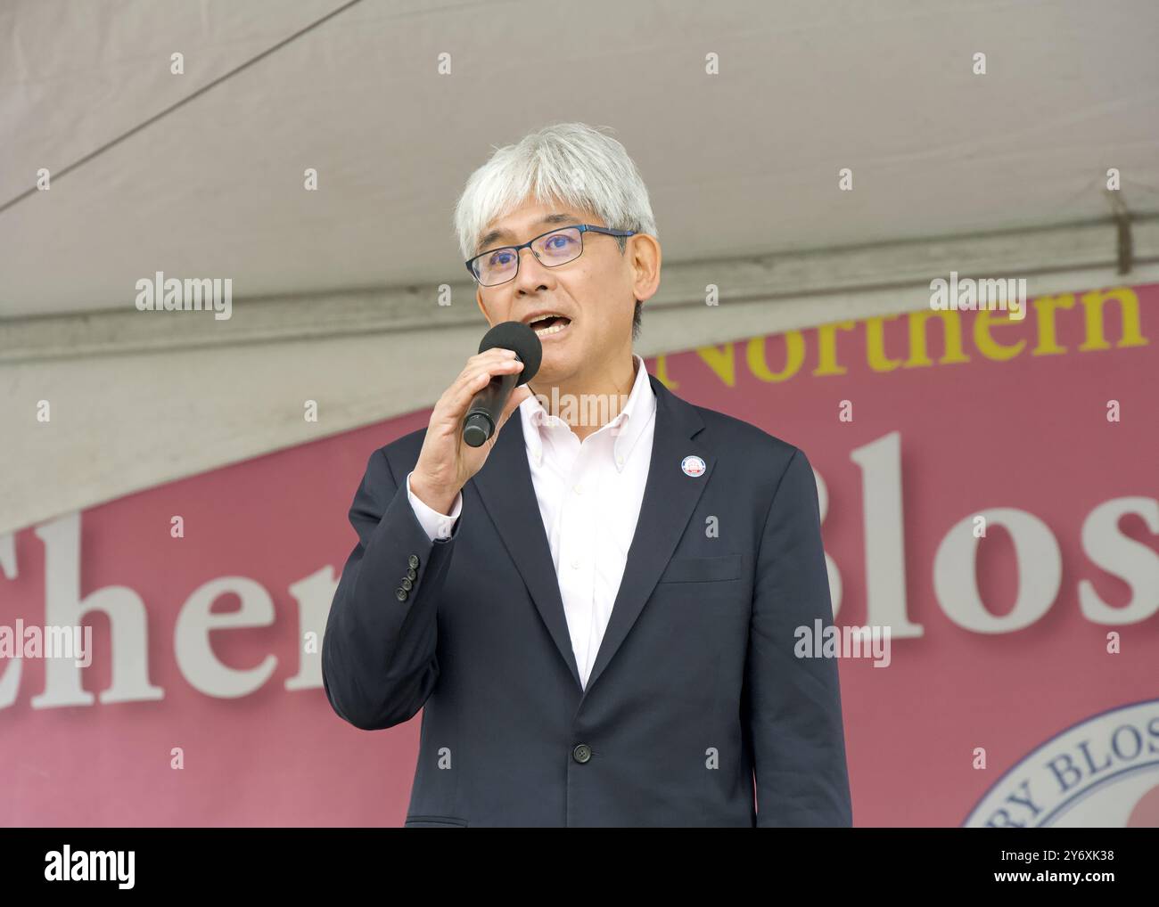 San Francisco, CA - April 13, 2024: JCCNC President Mr Kazuhiro Gomi speaking at opening ceremony for the Cherry Blossom Festival in Japantown. Stock Photo