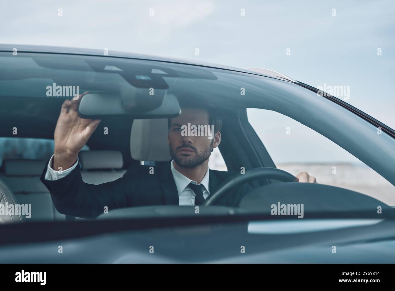 Adjusting the rear view mirror of a car hi-res stock photography and ...