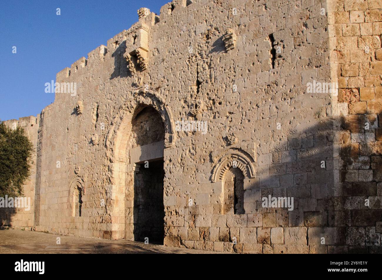 Detail of the intricate stone relief work and arches embellishing the outer Zion Gate in the Old City of Jerusalem. Stock Photo