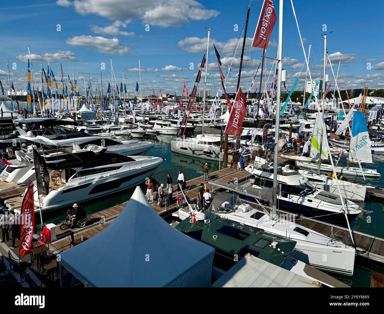 A mass of yachts seen in bright sunshine during the first day of  the Southampton International Boat Show. - Smartphone Captured Stock Image