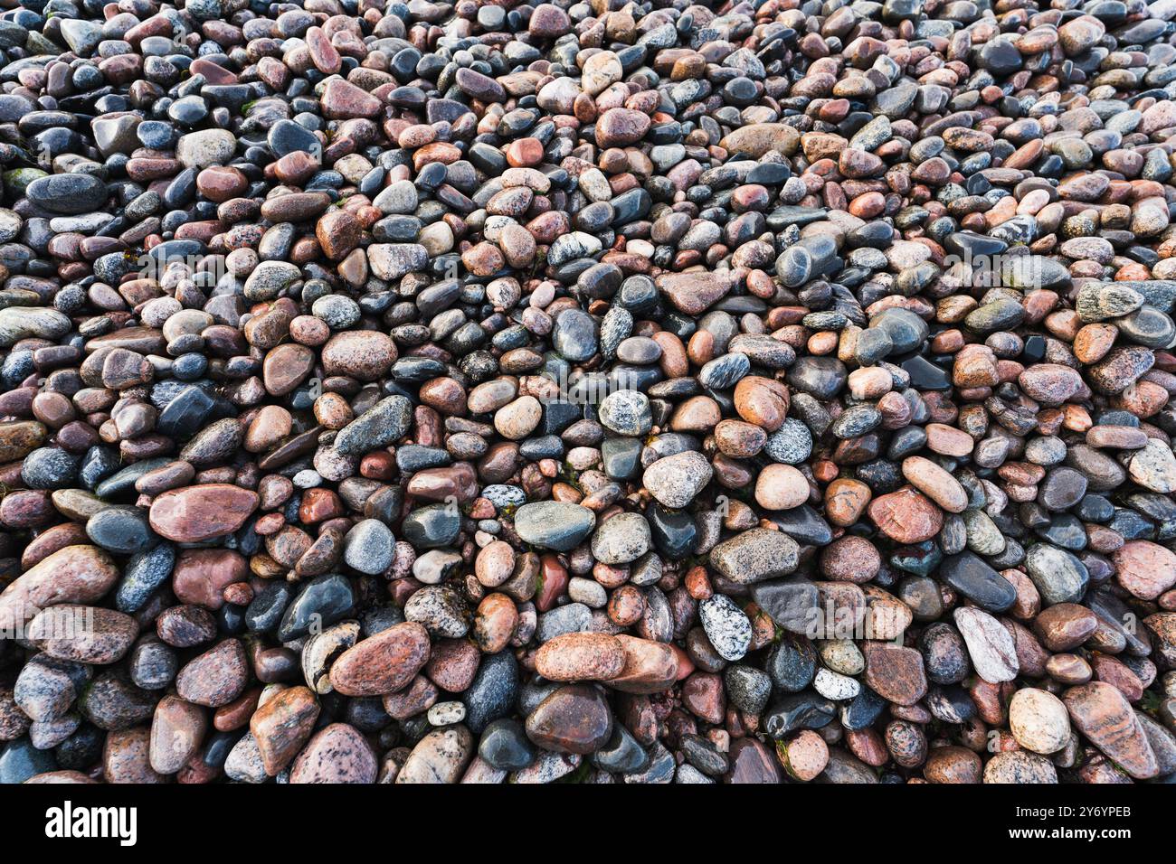 Photo background text beautiful clean pebble beach on the shore of the ...