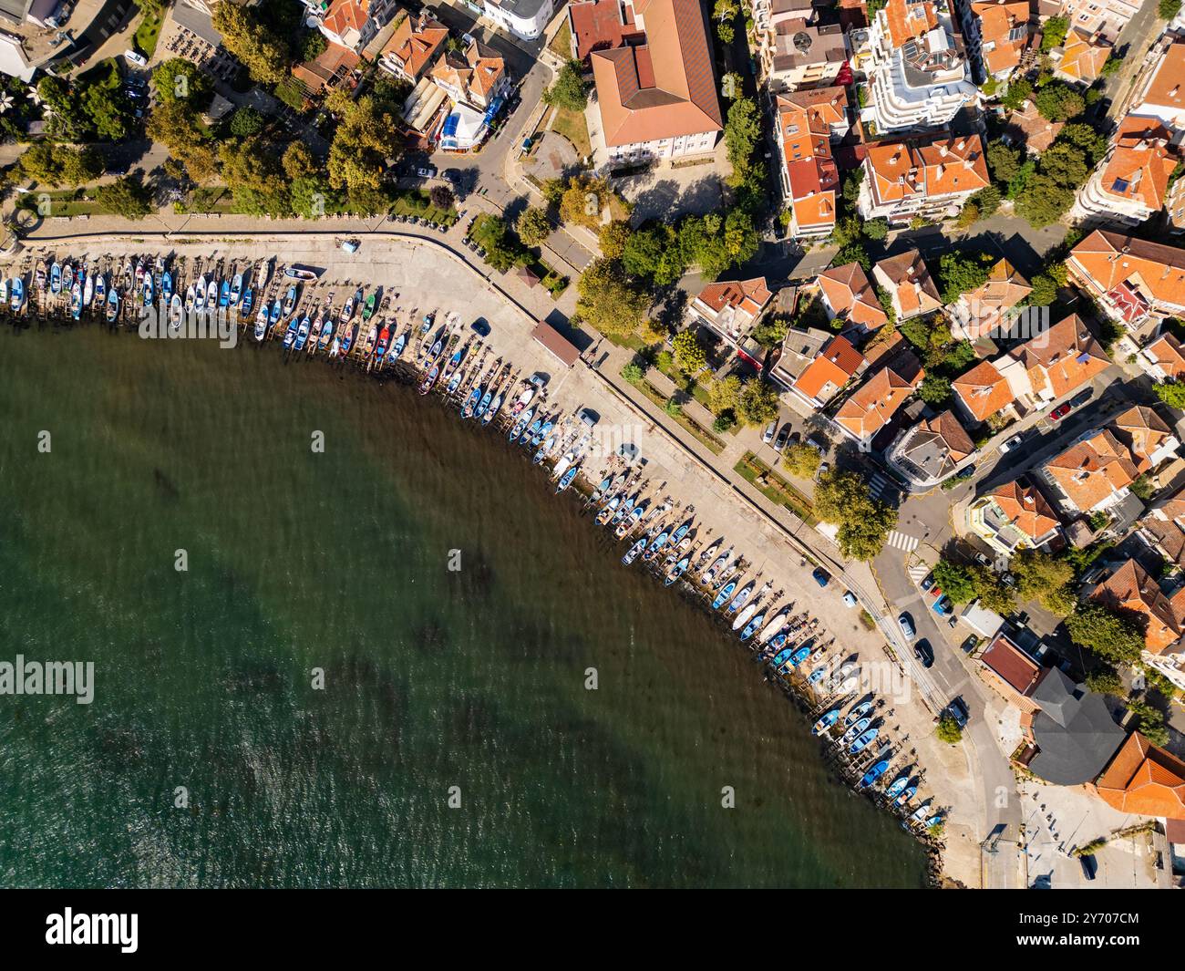 This coastal town features colorful rooftops, modern buildings, and a ...