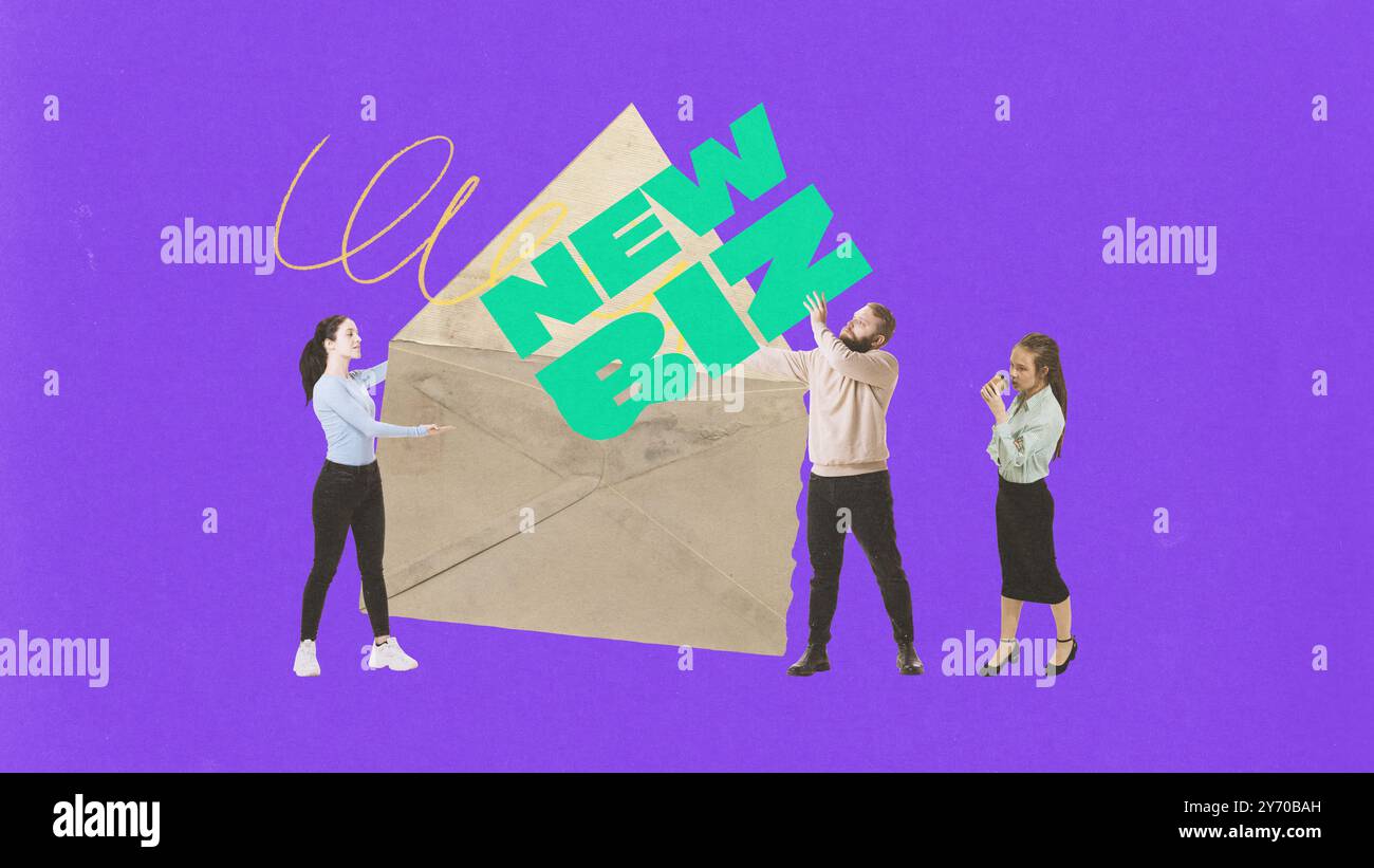 Three colleagues carrying bold New Biz sign in front of large envelope ...