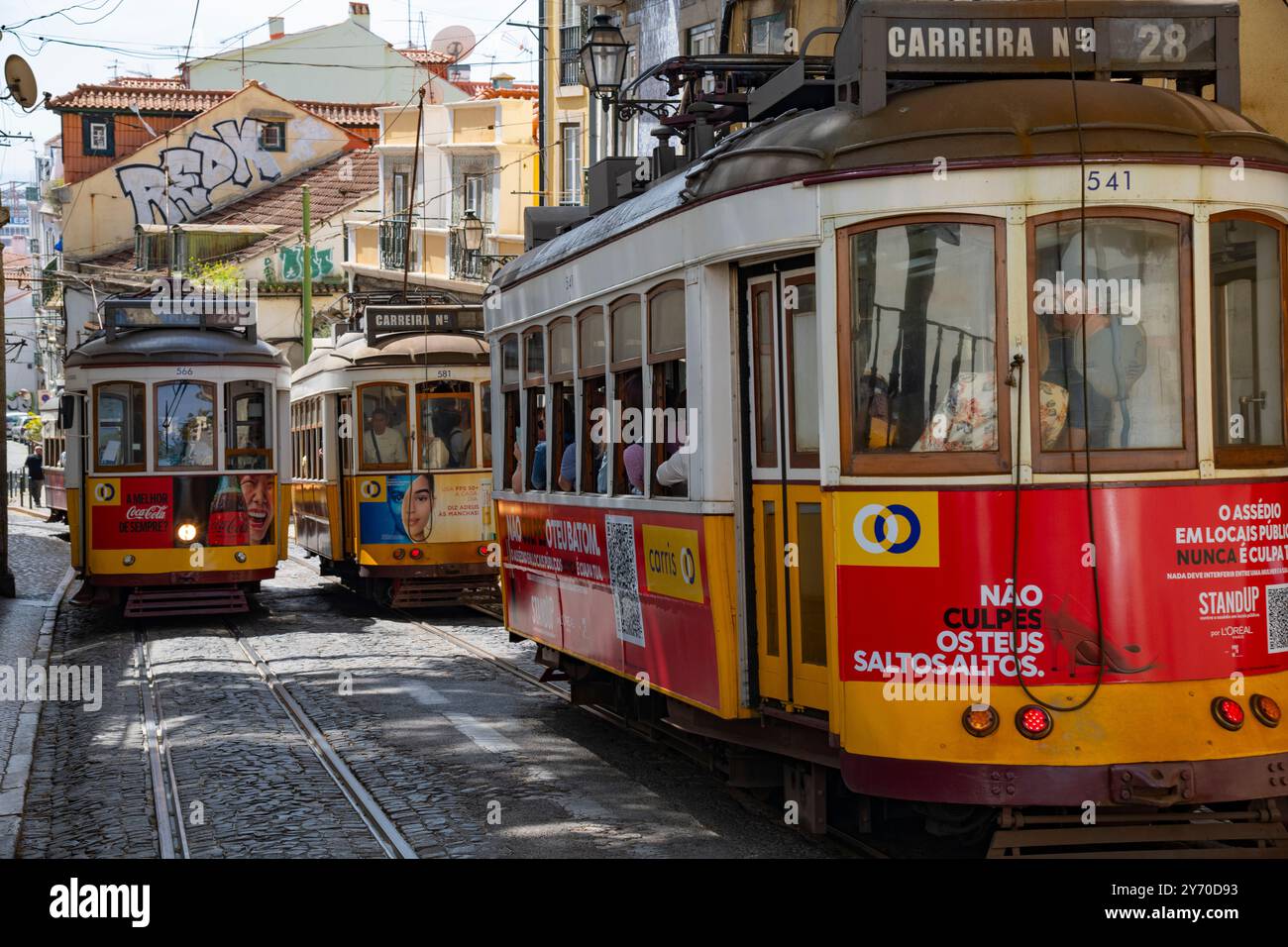 The Lisbon tram on the streets of Alfama, Lisbon, Portugal Stock Photo