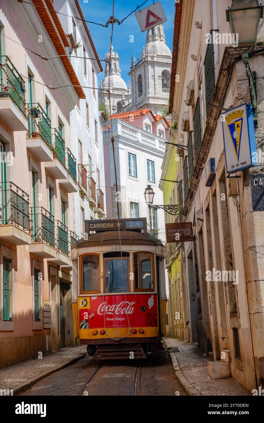 The Lisbon tram on the streets of Alfama, Lisbon, Portugal Stock Photo