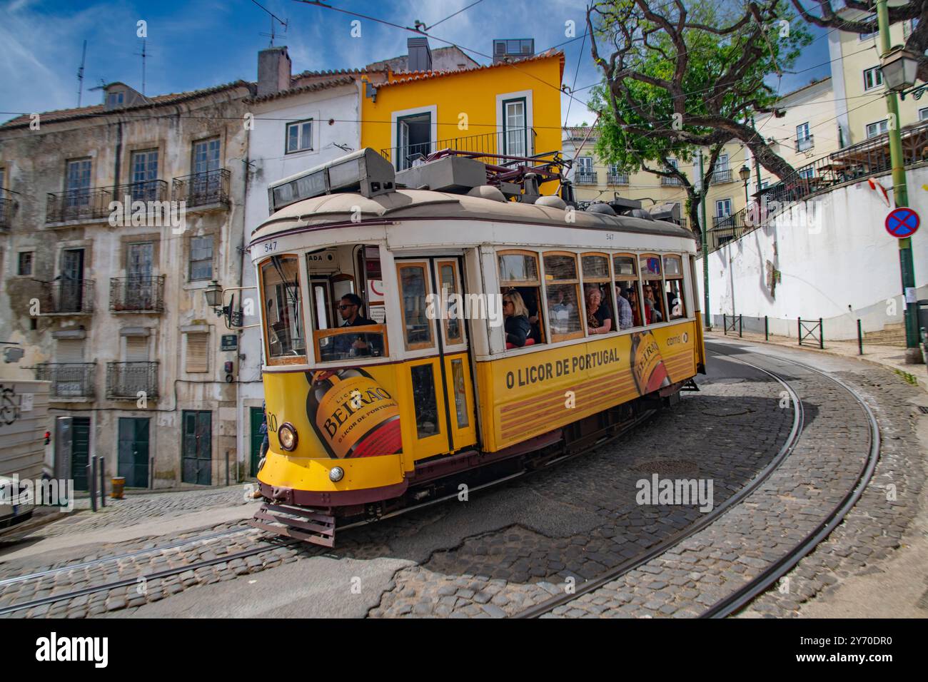 The Lisbon tram on the streets of Alfama, Lisbon, Portugal Stock Photo