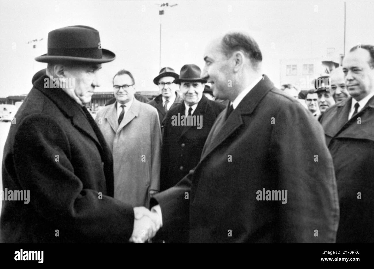 Czechoslovak Prime Minister Olldrich Cernik (R) bids farewell to Soviet Premier Alexei Kosygin as the latter left Prague Airport to fly back to Moscow yesterday following his 24 hour visit to the Czech Capital to sign the Soviet-Czech Treaty which provides for Russian Troops to be stationed in Czechoslovakia .The Supreme Soviet , Russia's Parliament , is likey to ratify the treaty this month . 18 October 1968 Stock Photo