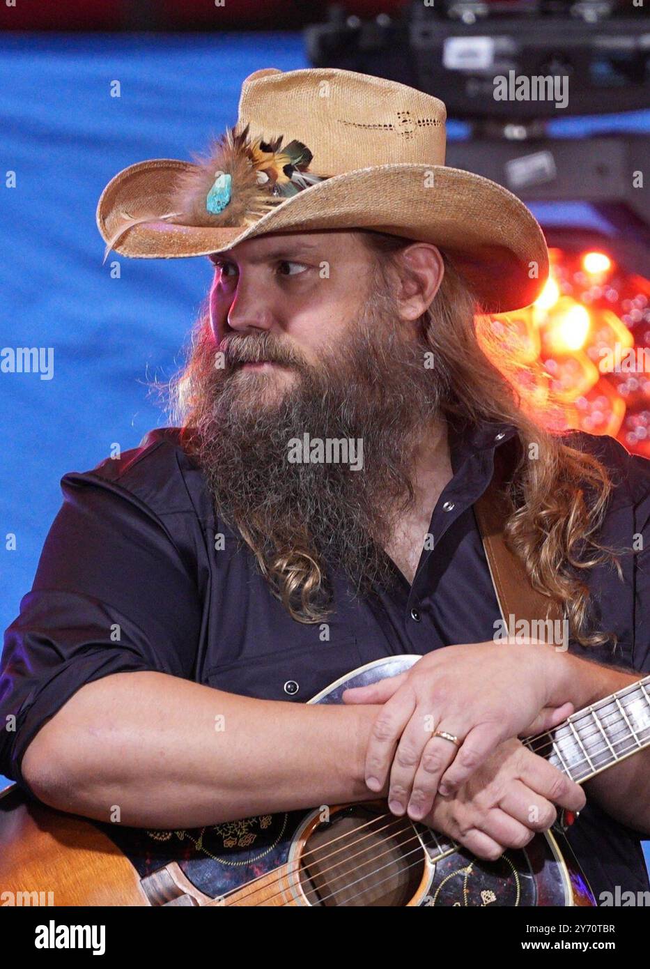 New York, New York, USA. 27th Sep, 2024. (NEW) Chris Stapleton Performs Live on the Today Show. September 27, 2024, Rockefeller Plaza, New York, USA: Chris Stapleton is a renowned American country singer, songwriter, and guitarist. Known for his soulful and powerful voice, he gained widespread attention with his debut album ''Traveller'' in 2015, which won Album of the Year at the CMAs. In addition to his solo career, Stapleton has written hits for artists like Kenny Chesney and George Strait. His wife, Morgane, plays a vital role in his band and career. (Credit Image: © Jorge Estrellado/Alamy Stock Photo