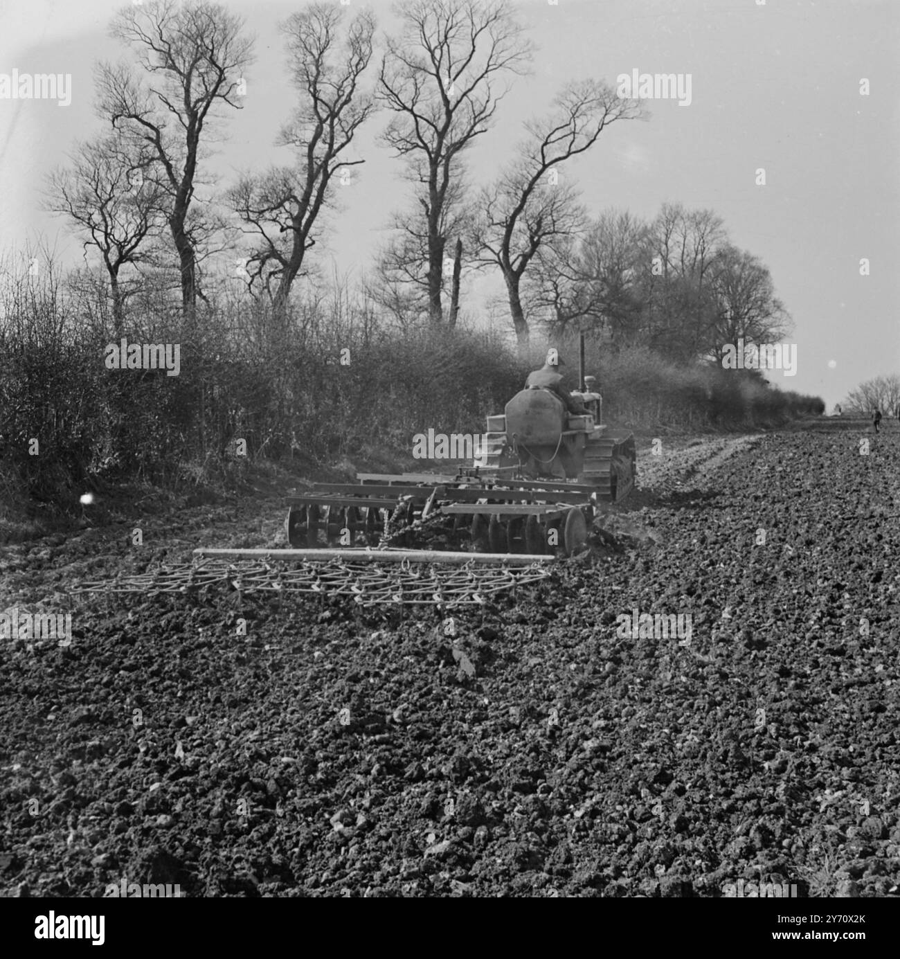 Discing and harrowing . 3 April 1947 Stock Photo - Alamy