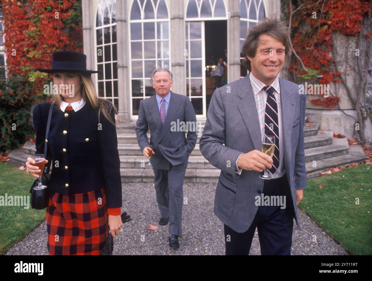Mrs Susan Sangster, Robert Sangster and friend Bungalow Bill Wiggins Cartier Million Horse race Dublin Ireland Eire 1989 1980s HOMER SYKES Stock Photo