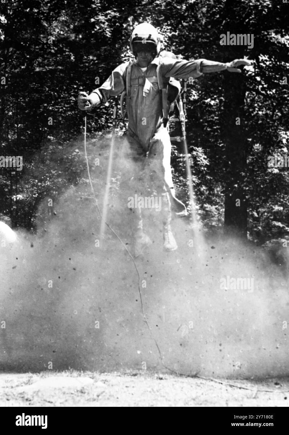 Flash Gordon , superhero of the strip comics for many years , has now entered the realm of human experience . Demonstrator Ed Kurczewski shows how a rocket belt has assisted him some 20 feet into the air , wearing military equipment . The man who could put a girdle round the universe quicker than Shakespeare's Puck will soon be wearing GI uniform and chewing gum . It is thought that soldiers of the future , equipped with rockets will be able to run and jump superhuman speeds and distances , Rockaway , New Jersey , USA 18 June 1958 Stock Photo