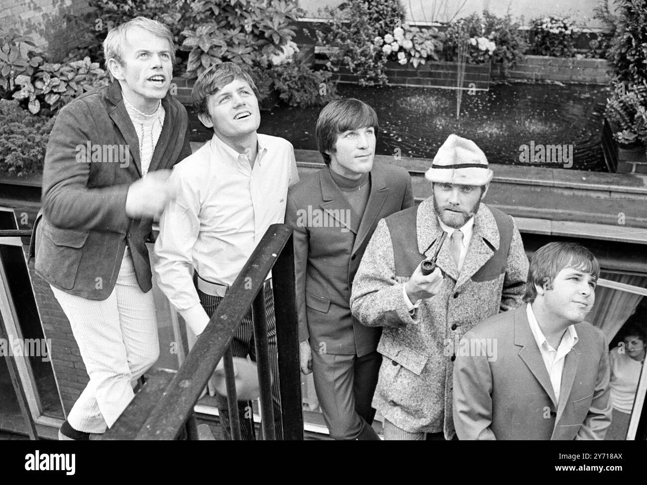 American pop group during a trip to the London offices of a recording company .  fronm the left:  Al Jardine , Bruce Johnston , Dennis Wilson , bearded Mike Love and carl Wilson  7 November 1966 Stock Photo