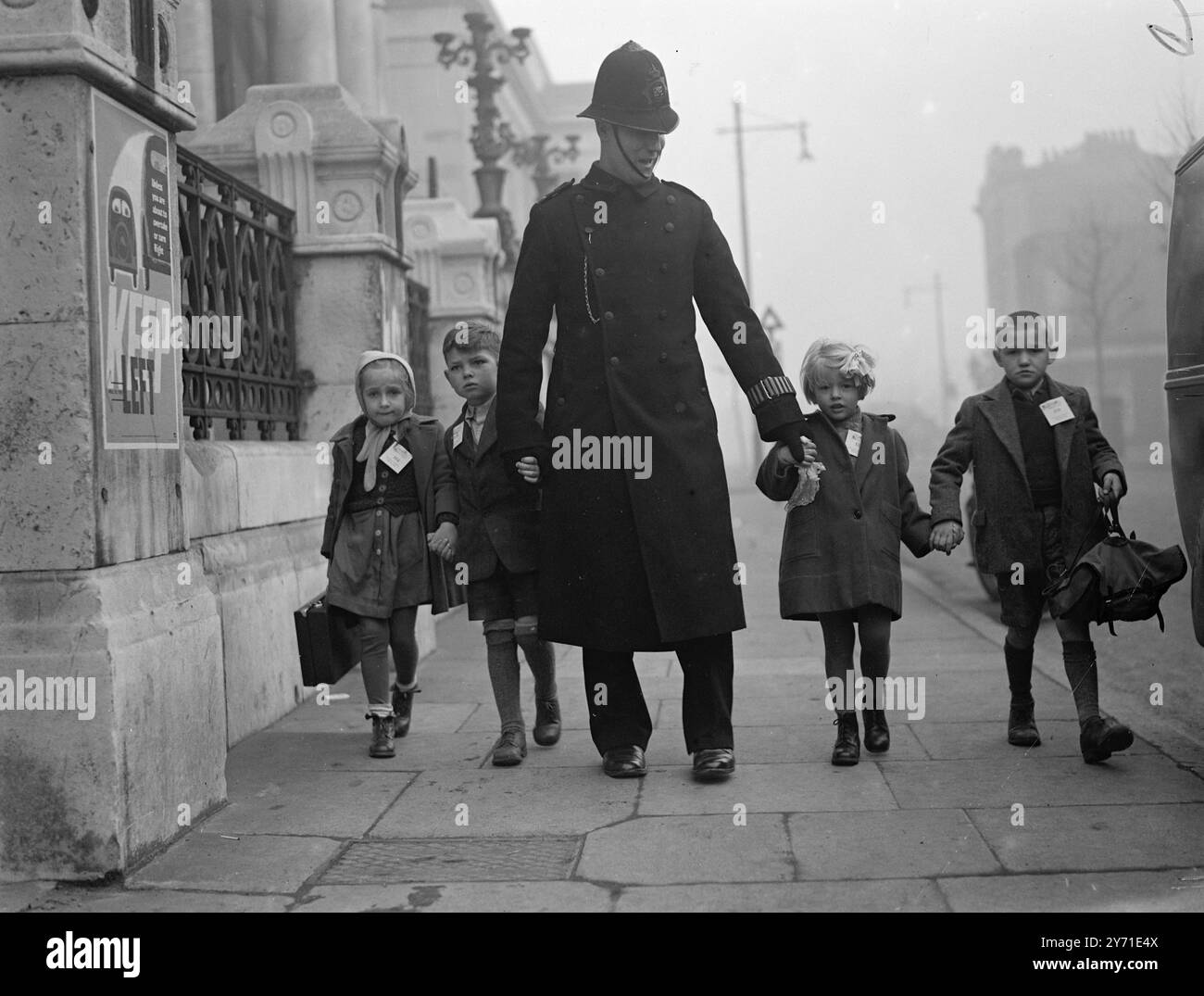 WAR ORPHANS GUESTS OF LONDONERSFive Hundred war orphans - Poles, Yugo-Slavs and Ukrainians were to-day (Fri) 'adopted' for one night by 500 families of the much bombed borough of Bermondsey, London. The children, aged from 5 to 15, were from orphanages all over the country. They were brought to England as ’'displaced persons” by UMRRA or the British - Control Commission. Nearly all lost their parents in concentration camps and many of the children themselves were in such camps, A dinner with Christmas trees, toys and presents is being prepared for the kiddles. PICTURE SHOWS:- A Police Constabl Stock Photo
