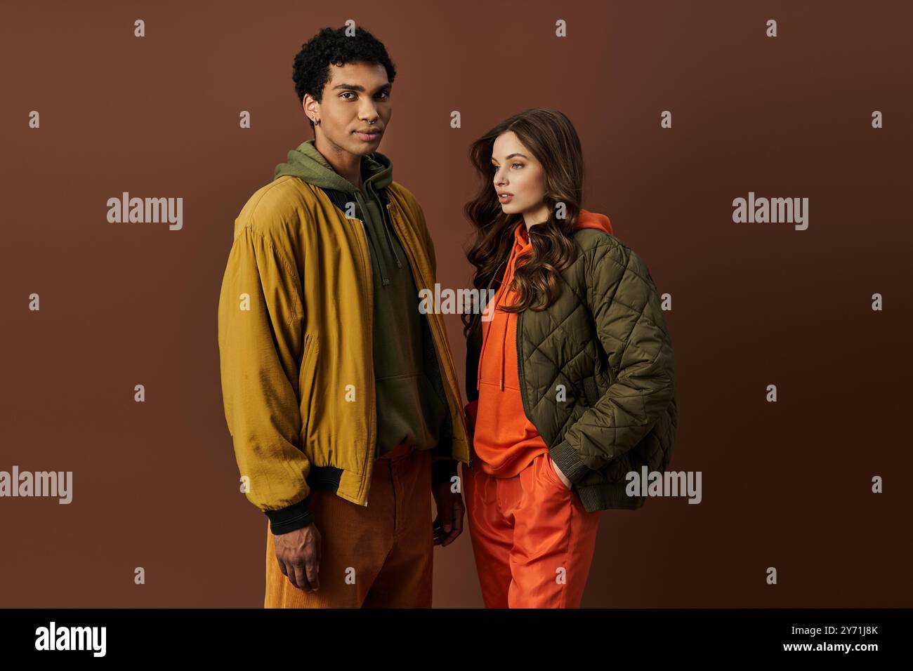 Color Couble A stylish young couple showcases autumn fashion with bold colors and ...
