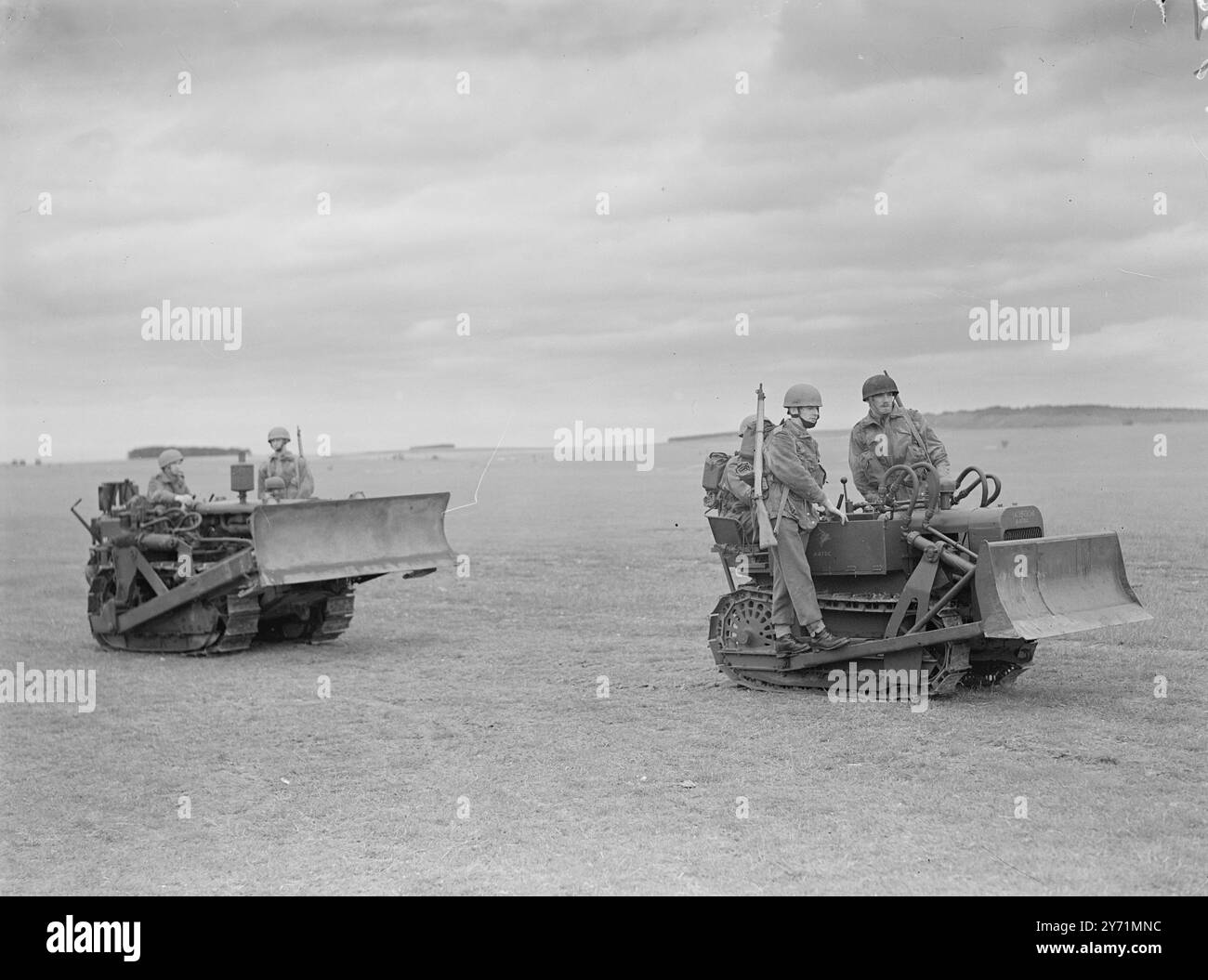 RAF EXCERCISE AT SALISBURY.    The R A F held a land / air exercise at Netheravon Airfield , Sailisbury . Among the aircraft employed in the excercise were spitfires , Halifaxes , Dakota ' s and gliders .     no caption     June 4 1948 Stock Photo